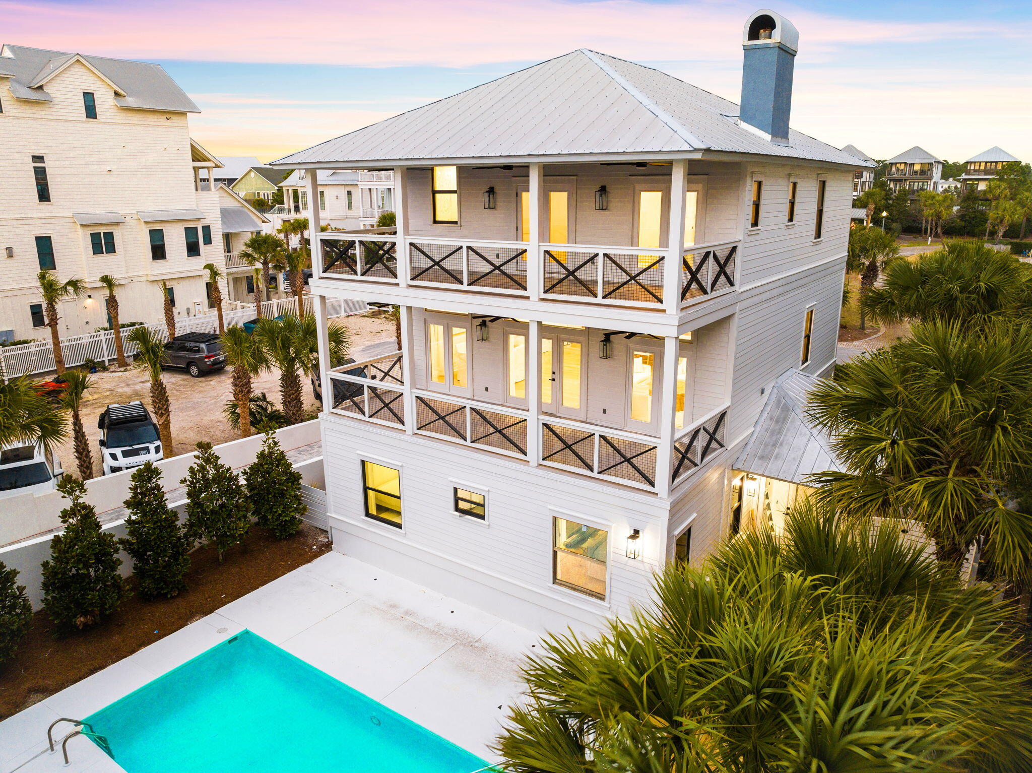 LOWEST PRICE PER SQFT ONE TIER OFF THE BEACH! Indulge in luxury living just steps from the pristine Gulf of Mexico in this exquisite 5 bedroom, 6.5 bathroom haven, meticulously renovated to perfection. Situated in the heart of Seagrove, this home exudes unparalleled charm and boasts captivating views of the emerald coast, enhanced by its own private pool. Enter to find a sanctuary of beach elegance, where fresh paint, new flooring, state-of-the-art appliances, and upscale finishes adorn every corner, revitalizing this remarkable property. The expansive open living area is bathed in sunlight, with sliding glass doors leading to a spacious porch offering breathtaking Gulf vistas from the living and dining spaces. The custom kitchen, fully redesigned, is a culinary enthusiast's dream.