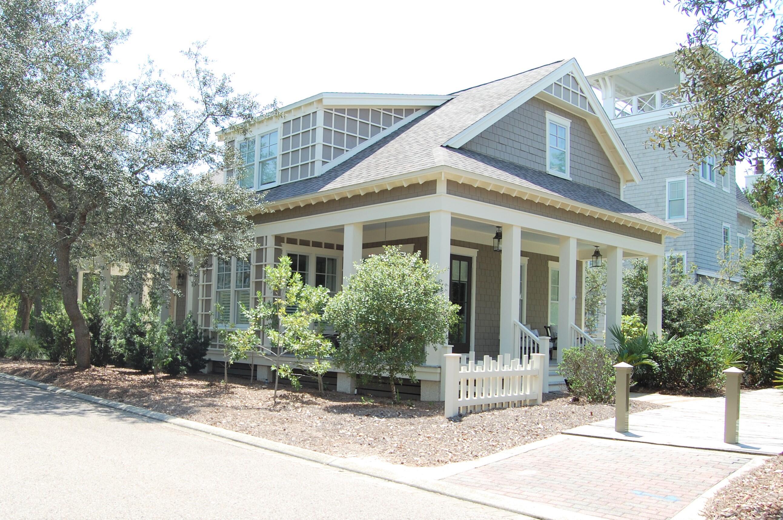 Welcome to 10 S Founders Lane, located on a desirable corner lot in the Dune Ridge neighborhood of gated WaterSound Beach. Less than 300 yards to the beach walkover, you're just minutes from having your toes in the sugar sand, enjoying the pristine peaceful paradise of the private WaterSound beach. Swim laps or just relax at the community pool only 500 feet from your door. 

This cozy 4 bedroom 4.5 bath beach cottage with open living area on the main floor sleeps up to 10 and each bedroom has an en-suite bath. The first floor primary suite has french doors that let on to one of the two wraparound porches. 

Offered fully furnished with a 4-seater golf cart that conveys, you can move right in and start exploring all that WaterSound and 30A has to offer The first floor boasts 10' ceilings which add to the open feel, and the second floor has 9' ceilings. Two of the upstairs bedrooms each have a queen size bed and the third upstairs bedroom has 4 built in bunks which is great for kids (or kids-at-heart). The built-in work station with cabinets in the upstairs hallway provides extra storage. 
When you come back from the beach, clean off the sand in the outdoor shower and enter the house directly into the generously sized mud room with laundry and toss the towels right in the washer. 

Relax on the front porch swing with a good book and listen to the sounds of nature or venture out on 30A for shopping and dining. 

The large corner lot has room for a pool and plans for a carriage house have been drafted, or you can build on to the existing home for additional square footage. A new roof was installed in 2022.

This home is perfectly positioned as a primary residence, vacation home or rental that is ideal for multigenerational family vacations. Start making memories today.