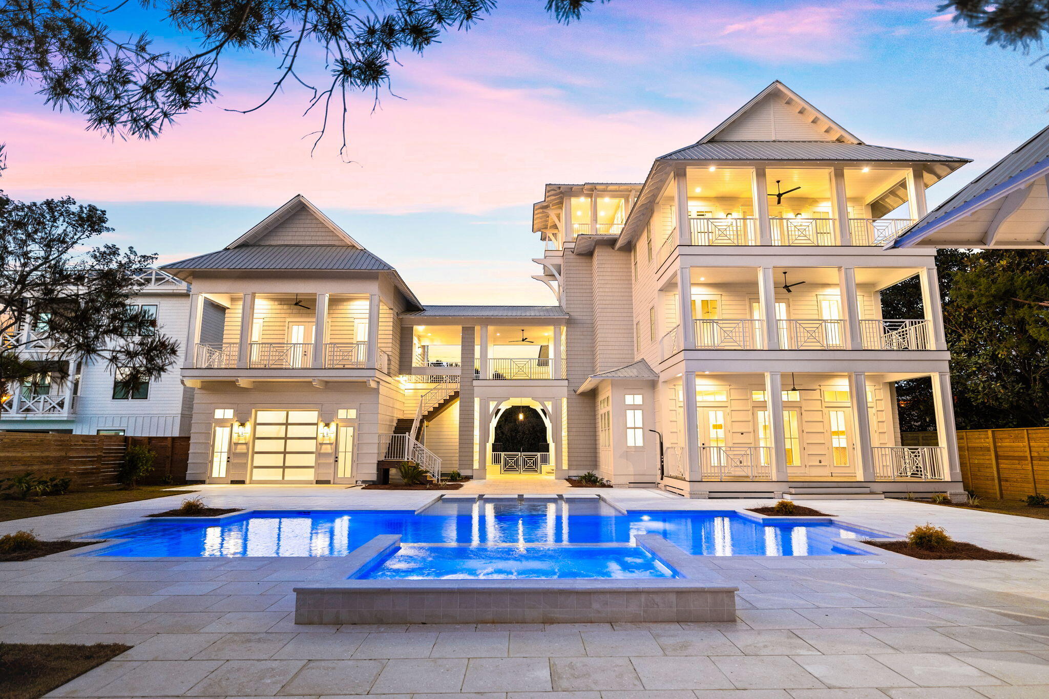 Experience luxury living at 161 Rolling Dunes, where sophistication meets comfort in this meticulously crafted compound estate set on an oversized lot half acre lot boasts 100' in width yielding an exceptional scale. This prestigious property boasts an impressive 7 bedrooms, 9 bathrooms, and spans 6,391 square feet of resort style living. Optimal short term rental opportunity abounds with $450k+ projected gross annual income with room to grow as this property establishes itself as a rare gem within the serene Blue Mountain Beach neighborhood. Notable features include a massive 50x30 private pool with ample outdoor living space and a private cabana complete with full summer kitchen, fireplace and exceptional space to entertain! Upon entry, guests are greeted by grandeur with soaring 12-foot ceilings that create an atmosphere of opulence throughout the residence. The allure continues with parking accommodations for up to 10 cars, ensuring convenience and exclusivity for every visitor.
Nestled on a half-acre lot, this oasis offers a retreat like no other, featuring not one, but nine charming porches, perfect for enjoying the serene surrounding. Immerse yourself in outdoor luxury with a large cabana, complete with a fireplace and summer kitchen, ideal for entertaining guests or savoring quiet moments under the stars.
Adding to the allure is a carriage house, providing additional living space with a bedroom, full kitchen, and washer dryer, offering versatility and functionality for modern living.
Indoors, four spacious living rooms beckon relaxation and social gatherings, while two fireplaces create an ambiance of warmth and sophistication. The expansive pool deck spans around 3,500 square feet, adorned with high-end concrete pavers, offering the ultimate setting for outdoor leisure and entertainment.

Culinary enthusiasts will delight in the gourmet Thermador appliances found within the two kitchens, ensuring every meal is prepared to perfection. Convenience is paramount with four sets of washer and dryer, three ice makers, and three refrigerators, catering to every need with ease.

Outdoor bliss awaits with a lavish 50 by 30-foot pool, inviting residents to indulge in the epitome of luxury living. Additionally, three garage doors provide ample storage and accessibility for vehicles and equipment.

Experience the epitome of luxury living at 161 Rolling Dunes, where every detail has been thoughtfully curated to elevate the standard of living. This prestigious estate, with its unparalleled amenities and timeless elegance, awaits those with discerning taste and a desire for the extraordinary.

Please reach out to us today for the cost-to-own and rental projection figures for the property.