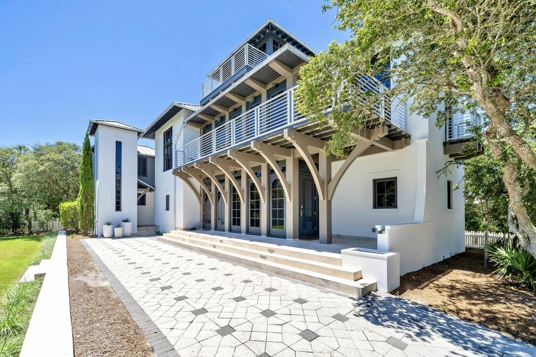 A rare opportunity to acquire one of Carillon's most iconic, high-end, custom-crafted homes, Captain's Quarters is a one-of-of-a-kind gem situated at a higher elevation only two houses from the beach walk over, and featuring views of the gulf and Lake Carillon across the street.   The main home, with stucco over block construction, features deck and patio spaces on the first, second and third floors of the residence. From the 3rd  floor tower you will enjoy dazzling views of both sunrise and sunset across the Gulf of Mexico and Lake Carillon.  The homes offer a total of 4 BR plus bunk area, 4 full baths and 2 half baths as well as extensive custom woodwork and brushed stainless steel. This home is vacation rental. For showing contact Martin, agent, at 216 214 0143. Further details MAIN HOUSE 1ST FLOOR:
Master King, private bath, TV
Guest King bed, private bath, TV
Guest Full, private bath, TV
Built in bunks in the hall

MAIN HOUSE 2ND FLOOR:
Amazing gourmet kitchen, table seats 10, breakfast bar seats 3
Living room with multiple sitting areas, TV
Powder Room
Viewing deck

MAIN HOUSE TOWER:
Panoramic views of the Gulf of Mexico, Lake Carillon, and Carillon Beach
TV
Viewing Deck facing the Gulf of Mexico

GUEST HOUSE 1ST FLOOR:
Queen Bed, TV, full bath
Built in bunks
Powder room
Laundry

GUEST HOUSE 2ND FLOOR:
Full kitchen
Living area, TV
