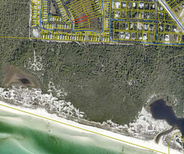 Build Your Dream Home in Cypress Dunes - Prime Vacant Lot in Phase 1

Nestled within the tranquil beauty of Cypress Pond in Phase 1, this exceptional vacant lot offers the perfect opportunity to build your custom dream home in one of South Walton's most sought-after communities. Located just one block from an award-winning elementary school and minutes from upscale shopping, dining, and entertainment, this homesite combines natural serenity with everyday convenience.

Set within the prestigious 44-acre gated community of Cypress Dunes, the property sits 25 feet above sea level and is surrounded by lush landscaping, a preserved 200-year-old Cypress Head, and sweeping views of a Coastal Dune Lake and the Gulf of America.

Backed by the untouched Topsail Hill State Preserve, residents enjoy access to over 3 miles of secluded white-sand beaches, scenic nature trails, campsites, and a host of outdoor recreation.

The state-of-the-art amenity center offers an infinity-edge pool, hot tub, covered outdoor fireplace, and an elevated sunset deck with panoramic Gulf views. Additional amenities include a second pool in Phase 2, tennis courts, boardwalks, a community lawn, and an elegant owners' lounge with a commercial-grade kitchen.

Located just five minutes from the acclaimed Sandestin Golf & Beach Resort, residents enjoy championship golf, tennis, a full-service marina, and the vibrant attractions of Baytowne Wharf. Nearby Grand Boulevard provides upscale shopping, fine dining, a movie theater, and essential services including Sacred Heart Hospital and Publix.

This is a rare opportunity to build in a community where nature, luxury, and convenience come together seamlessly. Welcome to Cypress Dunes.