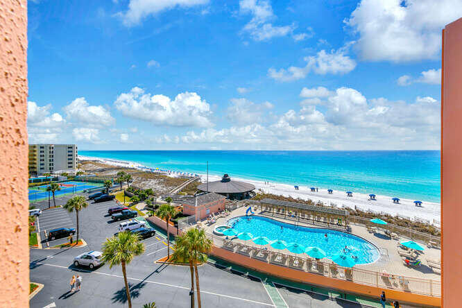 Dreaming of starting your days with unobstructed, panoramic views of the Gulf? This stunning 1-bedroom, 1-bath residence in the resort-inspired Jetty East Condominiums is a true coastal paradise! Your elegant features impact-rated EFCO windows and sliding glass doors, stylish tile flooring, and a modern kitchen complete with granite countertops, a chic backsplash, and a brand-new hot water heater. Carefully designed and decorated, it has been beautifully furnished for both comfort and sophistication. Indulge in top-tier amenities such as 900 ft of sugar-white beaches, a heated waterfront pool with a sundeck and hot tub, and a beachside grilling pavilionperfect for sunset cookouts. Enjoy the fitness center, sports courts, and robust activity calendar, all supported by proactive building management. Covered parking adds convenience to this exceptional lifestyle. Its proven rental history makes this a fabulous investment opportunity. Whether seeking a personal sanctuary or expanding your portfolio, this delightful unit offers the best of both worlds. Seize this chance before it slips away!