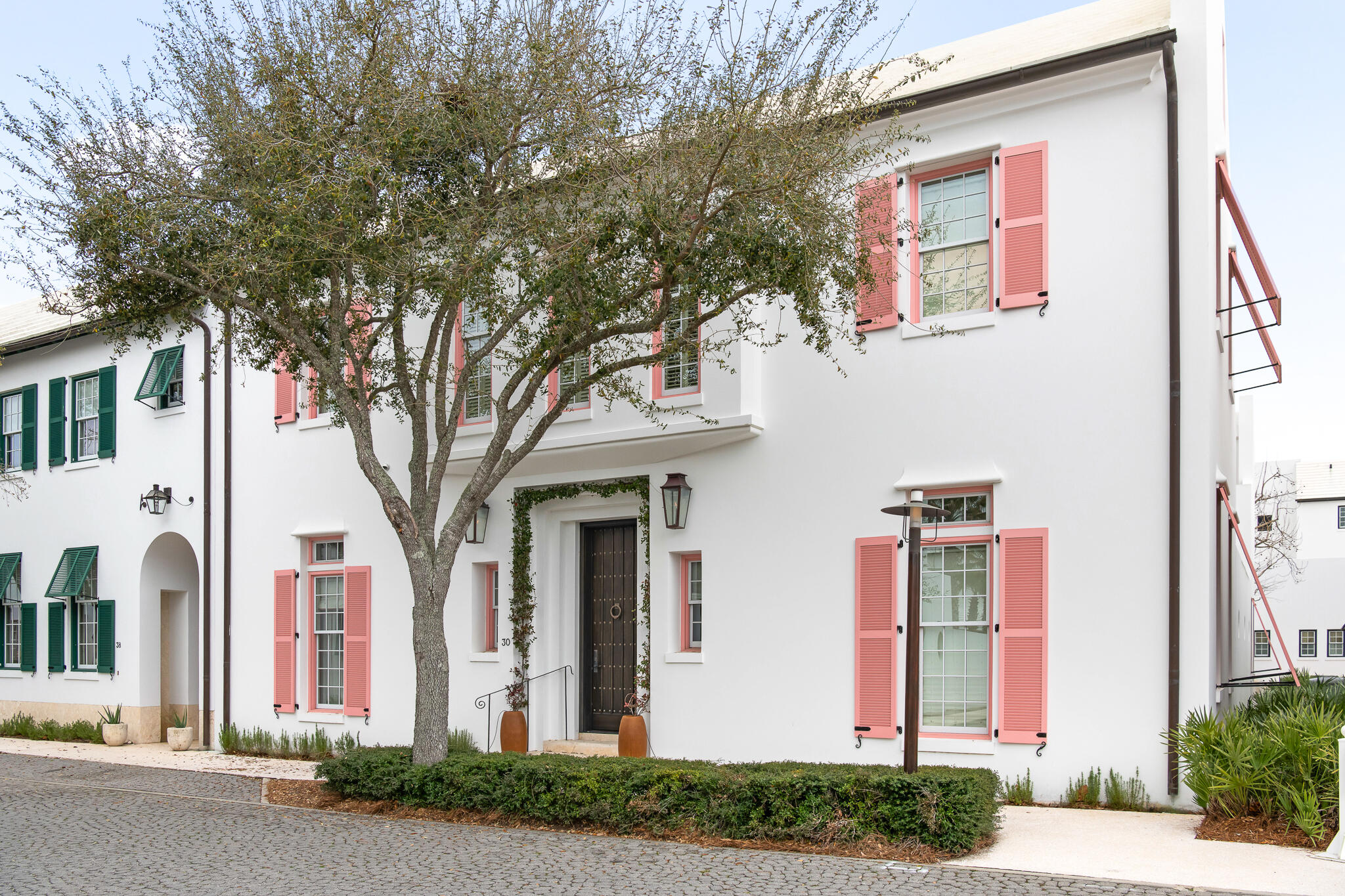 Welcome to an iconic masterpiece designed by Chael Cooper and Associates, perfectly embodying the essence of the Bermudian Alys Beach design & living. The architectural details of 30 N. Charles Street are pronounced and unmatched.  

Nestled on prestigious North Charles Street, this stunning residence boasts a grand courtyard complete with a luxurious swimming pool and a beautifully appointed covered Loggia having well-appointed landscaping, ideal for entertaining or simply enjoying privacy outdoors. 

Providing 3,109 sq. ft., this home features 4 bedrooms plus a bunk room accompanied by 4.5 bathrooms. As you step inside, you are greeted by a grand foyer accentuated by double-height ceilings and an elegant staircase, setting the tone for the sophisticated ambiance that permeates the home cascaded with Venetian Plaster. The connectivity to the dining and kitchen area flows seamlessly into the family room, while offering picturesque views of the mesmerizing courtyard--perfect for creating gourmet meals or enjoying quality time with loved ones. 

The primary suite, located on the second floor, features a private balcony that overlooks the serene courtyard, providing a personal retreat for relaxation. The fourth guest suite, thoughtfully designed as a separate space, ensures privacy for your visitors while offering a rooftop terrace where they can bask under the stars. The two additional guest suites provide private bathrooms along with the others.

This remarkable home comes fully furnished, designed by the renowned design firm Bohlert Massey and is ready for you to enjoy the luxurious lifestyle that Alys Beach has to offer. All Alys Beach amenities are at your disposal upon purchase.  Don't miss your chance to make this dream home your own. Properties of this caliber do not last long! 

Contact us today to schedule your private showing!