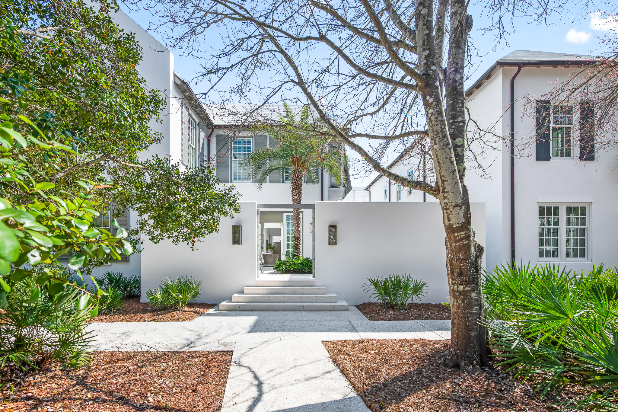 Discover the elegance of 75 Featherbed Alley, a stunning residence designed by the acclaimed Domin Bock Architectural Firm, renowned for its numerous design contributions to Alys Beach. This exceptional home opens directly to the iconic Central Park, nestled between the luxurious Caliza Pool and Restaurant and the protected Nature Preserve. The location is unrivaled, offering picturesque park side landscaping while maintaining ultimate privacy.

Spanning 2,905 square feet, this remarkable home features 4 bedrooms and a thoughtfully designed layout. The first floor encompasses the connected kitchen, dining, and living areas, highlighted by slider doors that fully open to reveal the breathtaking courtyard. This outdoor oasis boasts a full-length lap pool, a Summer Kitchen, and stunning areas for outdoor dining & sunbathing, creating the perfect environment for relaxation and entertainment. The courtyard gates seamlessly open to Central Park, fostering a harmonious living experience.  Community chaise loungers are provided to sneak away to read your favorite book in the park.  

In addition to the first-floor amenities, a detached guest suite overlooks the courtyard and pool, providing an inviting refuge for visitors. The property also includes a spacious two-car garage.

Ascending to the second floor, the primary suite is a sanctuary of light, adorned with surrounding windows that flood the space with natural illumination. Two additional guest suites on this level ensure privacy for visiting family and friends. The first floor features elegant coral shell stone pavers, which transition to beautiful oak flooring at the staircase, leading throughout the second floor.

75 Featherbed Alley is a true embodiment of luxury and comfort, perfectly situated to enjoy the best of Alys Beach living. All amenities are included with ownership, which includes the private owners Beach Club.  Experience this unique property today and immerse yourself in its unparalleled charm and sophistication.