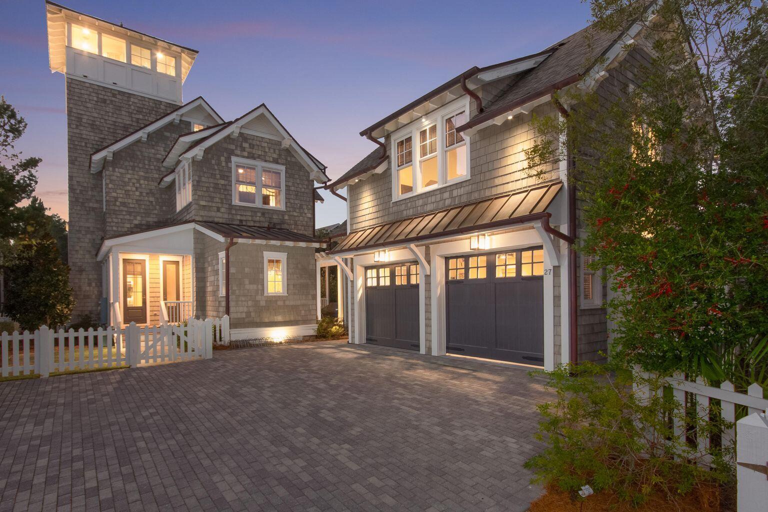 Exceptional luxury immediately comes to mind as you are welcomed by the warmth and privacy found only at 27 Signal Court in the exquisite community of WaterSound Beach. The home was thoughtfully planned, artfully crafted and beautifully executed to create a private luxury family retreat. On the exterior, expansive porches overlook Signal Park and meandering paths flank the home, while the interior finishes of the home are reminiscent of a New England coastal sanctuary. The pinnacle of the home is a gracious spiral staircase, leading to a splendid tower room and balcony. Evocative of those found in classic lighthouses. The sweeping spiral staircase leading to the fourth floor welcomes you to enjoy Gulf views and stunning sunsets. Additional information on this stunning home...Custom planned by the original owners with T.S Adams Architecture and built by Monte Hewett Homes, no corners were cut in the creation of this masterpiece. Evidence of this are features such as sound insulation within the interior walls and insulation underneath the first floor. Exterior finishes include a copper roof, protective gutters, two car garage, carriage house and double outdoor showers. Classic architectural touches abound in this exceptional WaterSound Beach residence.