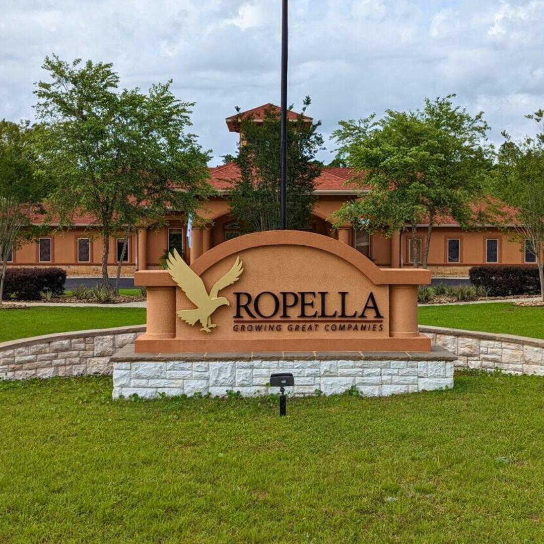 NAI Pensacola is pleased to present 8100 Opportunity Drive, the executive headquarters of ROPELLA Executive Search, which places high-performing C-Suite executives around the world.
 This 17,504 SF+/- property is a true gem, boasting a beautiful design, meticulously landscaped grounds, and a convenient porte-cochere at the entrance. Step inside and be captivated by the grandeur of the expansive reception area, adorned with high ceilings, elegant light fixtures, and a modern design style. This impressive building offers optimal work efficiencies and flows with nineteen private offices, including two executive suites with private restrooms. Stay connected on a global scale with dual fiber optic internet, two conference rooms, video security systems, and an A+ energy system. In addition to the main headquarters, there is a separate two-story outbuilding that provides 3,053 square feet of storage space and a living area. Perfect for hosting out-of-town business guests, the tastefully designed apartment offers a full kitchen, comfortable bedrooms, a spacious living area, laundry facilities, and a well-appointed bathroom.

8100 Opportunity Drive was originally built in 2008 as the headquarters for the Ropella Group, a leading executive search firm. Qualified investors will be pleased to acquire fee-simple interest in this remarkable property.

For sale or For Sale Leaseback option - The seller, The Ropella Group, is offering a 10-year sale-leaseback, and will sign an absolute NNN lease that will be effective upon the close of escrow. The lease is structured so all repairs and maintenance will be borne by the tenant and provides an annual 3% rent escalation.

Ropella has become the world's leading executive search and consulting firm specializing in the chemical, consumer products, and technology industries. By implementing a groundbreaking recruitment process, The SMART Search System, a 12-step system has revolutionized the hiring process. Ropella Executive Search has invested 35 years into researching and fine-tuning best practices, developing their own tools and techniques to continuously improve their processes to deliver precise and predictable hiring results.

Located within the fully developed Santa Rosa Industrial Park with tenants to include Pate Stevedore, Gulf Power, Goldring, Santa Rosa Sheriff's Office, Bose, and Aerosync to name a few.