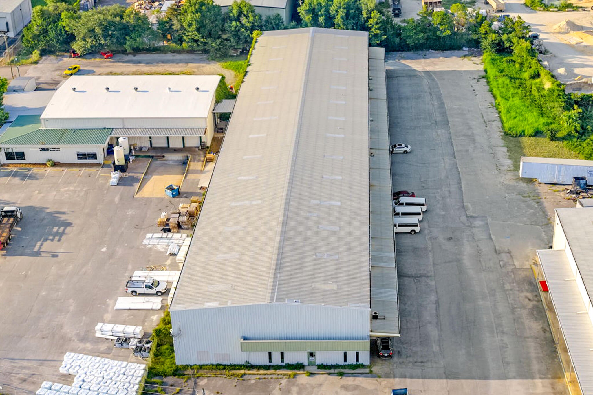 Welcome to 33 NW Jet Drive - a versatile industrial property built for functionality and efficiency. This well-maintained facility features four oversized bay doors, each measuring 11'11' wide by 16'4' tall, providing easy access for trucks, equipment, or large inventory. Inside, the building offers an expansive 31'2' ceiling height, with 28'4' to the tallest eave, ideal for high-clearance storage, racking systems, or specialized machinery.

In addition to the warehouse space, the property includes a small, built-out office area complete with two bathrooms, perfect for administrative operations or a break area for staff. Don't miss this rare opportunity!
