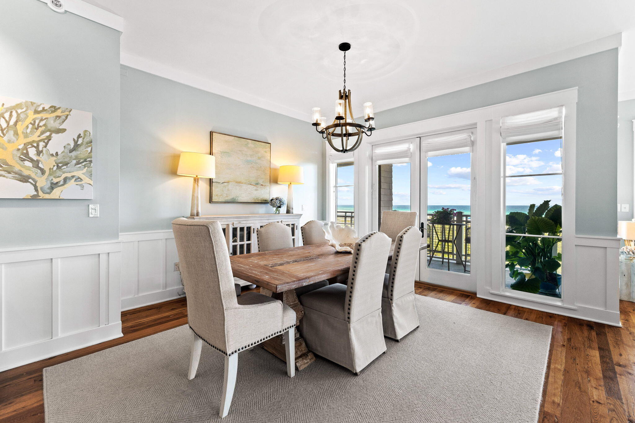 Overlooking the dunes of Watersound Beach and emerald coast waters,
this luxury penthouse condo boasts some of the best views on 30A. With
over 70 feet of gulf frontage and two large porches with wide overhangs,
there are unobstructed gulf views from most rooms. This 4 bedroom, 4
1/2 bath penthouse was recently renovated by Summer House Design.
With 10 to 15 foot ceilings, an open floor plan, 4 en suite bedrooms, a
powder room, and laundry room, this large end unit feels more like a
home. The casually elegant design features hardwood floors, marble tile,
and granite countertops in the remodeled kitchen and bathrooms. The
gourmet kitchen has Viking appliances and a large island and pantry. The
master bathroom features 2 custom vanities, a walk in shower, and.... a stand alone soaking tub. With 2842 sq feet and a one car garage, this is the largest floor plan in Watersound Beach. Furniture and artwork reflect a casually elegant coastal decor and are included. Compass Point II was designed by the acclaimed Graham Gund Architects and emulates the Nantucket style found throughout Watersound Beach. With only 25 residences in Compass Point II, this low density complex has a private pool for the sole use of Compass Point owners. Compass Point is situated between Deer Lake State Park and Camp Creek Lake offering opportunities for hiking, kayaking, paddle boarding and fishing. It is a 7 minute walk to the St Joe Beach Club and 1.8 miles from the Camp Creek golf course.