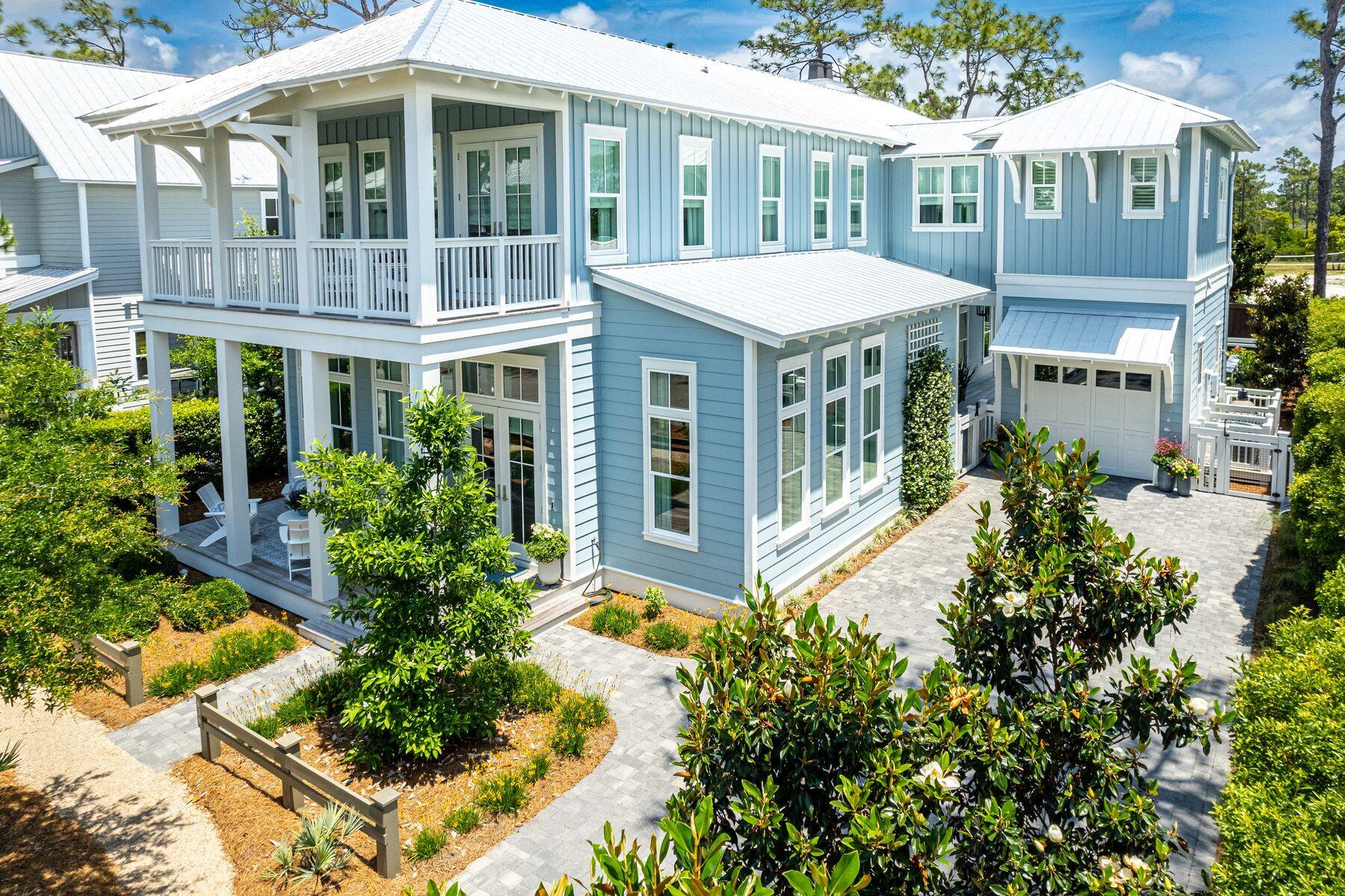 Discover luxury and tranquility nestled in the prestigious amenity-rich community of WaterColor.  This elegant and sophisticated home custom-built in 2021 by Romair Construction features almost 4200 SF of stunning finishes, 5 bedrooms, 5.5 bathrooms, an outdoor oasis with a private jetted pool, and an outdoor kitchen, all enhanced by beautiful lush landscaping.  The great room will immediately impress with 12-ft high ceilings and beautiful windows, each adorned with custom window treatments.  In the kitchen, full-height wall cabinets create a bright and airy atmosphere in this space, perfect for any chef to work their culinary magic. Wolf and Sub-Zero appliances offer a 36-inch dual fuel range, pantry, and a separate butler's pantry, including an additional sink (more...) preparation area, and laundry. The spacious grand island provides ample room for enjoying cocktails and snacks. The adjacent stunning custom wine room features curved custom shelving, mahogany cabinetry, and Wi-Fi-controlled temperature and humidity, making it a dream come true for wine enthusiasts. 

Spread over two floors, this meticulously maintained five-bedroom, with 2 living areas, includes multiple porches, terraces, and sitting areas, providing ultimate privacy and relaxation space for family and guests. Designer lighting and shiplap walls create custom detailing throughout the living rooms, bathrooms, and staircase. The home boasts upgraded HVAC, a standby generator, and the latest smart home technology monitoring security, lighting, and sound systems. A Sonos sound system subtly delivers background music to the great room, porches, pool, and two primary large master suites. This exceptional property features a paved extra wide driveway leading to an oversized detached garage, accommodating six total cars, and connected to the house by a covered pathway. Cumaru wood decking is featured on all porches. The two spacious front porches provide a shaded spot to relax and socialize while overlooking a lovely park. Both screened rear porches showcase a stucco gas/wood fireplace and tranquil views of the backyard oasis. This cozy outdoor lanai leads to the pool terrace providing the ultimate haven to socialize, entertain and for soaking up the sun's warmth while listening to the waterfall trickling into the pool. Relax in the jetted pool, allowing ten therapy jets to soften tense muscles after a day of enjoying the many private community club amenities.
WaterColor was created with families in mind and offers the charm of small-town life. WaterColor Resort is tucked between the beautiful pristine beaches of the Gulf of Mexico Emerald Coast and Western Lake, a natural 220-acre unique coastal dune lake. WaterColor is rich in natural beauty and offers exceptional community amenities which include a HOMEOWNER OWNED gulf front beach club, featuring 3 pools, a full-service restaurant, new restrooms and easy beach-to-pool access. The separate Camp WaterColor offers a lazy river and slide, multiple pools, park, lush green spaces and food/drink service. Enjoy miles of walking/bike trails, a boathouse offering kayaking, canoeing and paddle boarding, outstanding clay court tennis and pickleball facility and a short biking distance from the shops and restaurants in Seaside. Every year since 2013, WaterColor resort has received Forbes' Four Star designation, making it the most decorated property in northwest Florida and beginning in 2016, and every year since, the readers of Conde Nast Traveler voted it the region's number one resort.