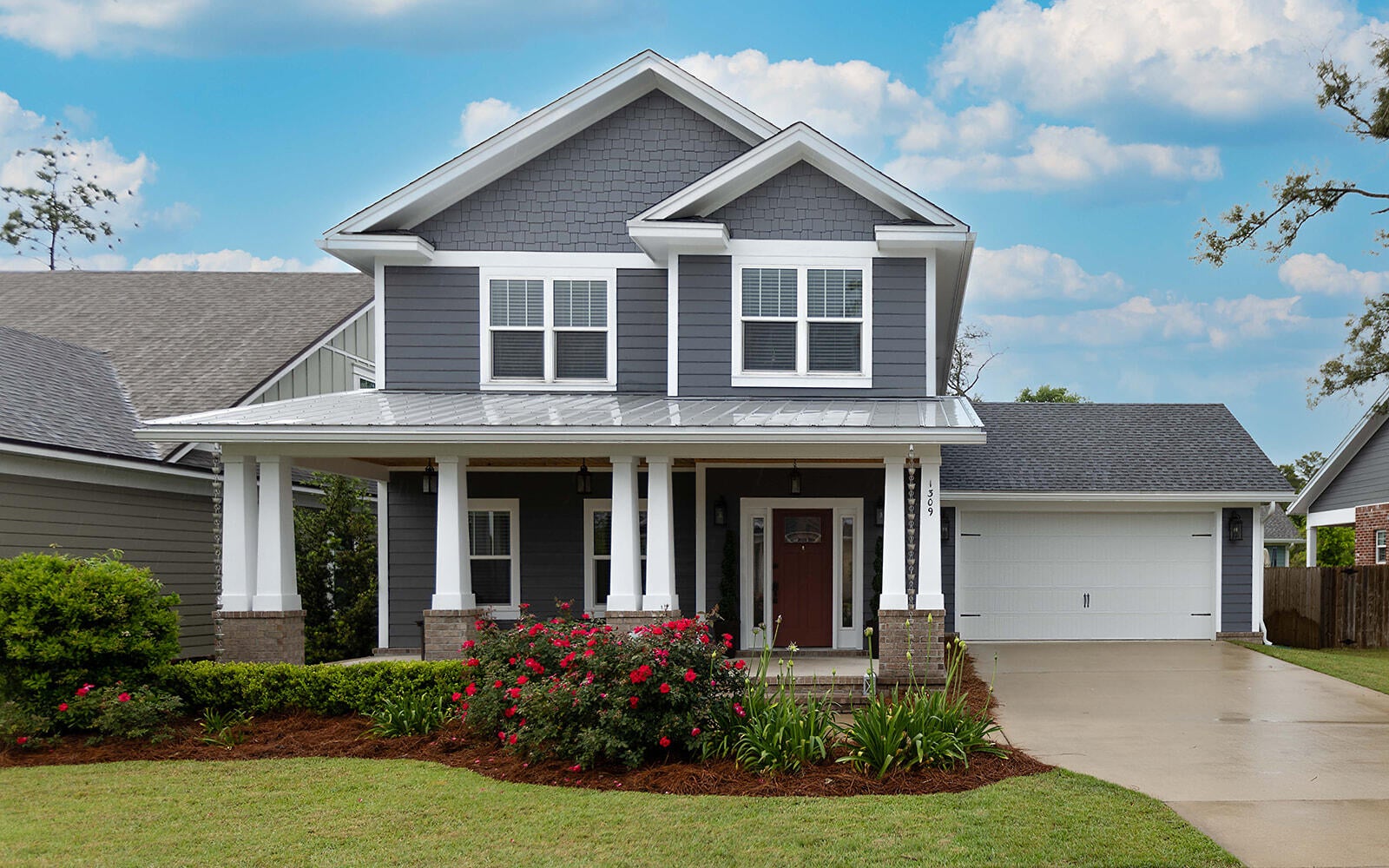2018 Parade of Homes Winner! This Southern Style home offers 3BR, 2 1/2 baths in desired Deer Moss Creek. The kitchen boasts quartz countertops, subway tile backsplash, under-cabinet lighting, HUGE island, stainless steel appliances, wainscotting and much more. This home has high impact doors and windows and 2X6 exterior walls. Downstairs flooring is gorgeous wood-look tile, while there is carpet in all bedrooms. Closets have wood shelving. Practical features include gas fireplace, gas stove, gas grill hookup, sprinkler system and privacy fenced yard. Hardie Board siding, brick skirting and a cedar lined porches give this home the perfect Southern custom feel! Don't wait on this one.
