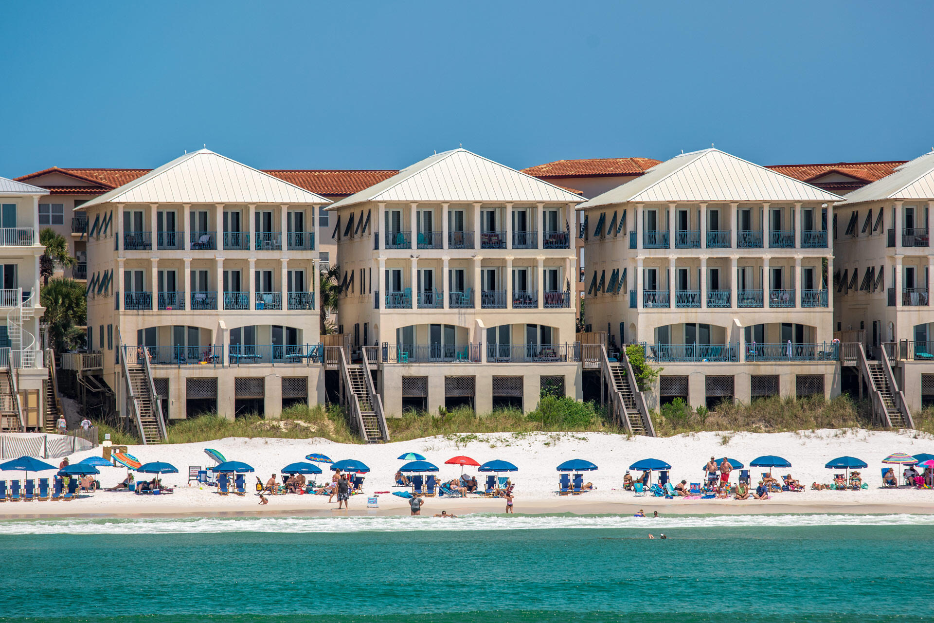 Welcome to The Salty Whale, an exquisite beachfront home. This beautifully refurbished five bedroom vacation destination boasted $241k in 2021 rents and directly faces the Gulf of Mexico. It is centrally located in the prestigious residential community of Frangista Beach.

The first floor is at beach level with a double set of glass doors off one of the spacious master bedroom Suites. They lead out to a plunge pool patio that overlooks the gulf. This room has access to a full hall bath that also serves a kids guest bedroom including white, ship-like bunks with two queens and two fulls. The roomy living area on the second floor has honey blonde hardwood flooring and a triple row of floor to ceiling glass doors that lead out to a beachfront balcony with plenty of space for outdoor dining and lounging.

The open kitchen with stainless steel appliances features space for two at the quartz counter height bar. The guest bedroom on this level has a Juliet window balcony and access to a full hall bath that doubles as a powder room.

The main master bedroom with an en-suite luxury bath is on the top floor with a triple set of glass doors that lead out to the romantic private balcony with beach views. Another king bedroom is also on this level with access to a full hall bathroom.

Frangista Beach has an exclusive gated lushly landscaped oasis that features a sparkling freshwater community pool that's a short stroll away.