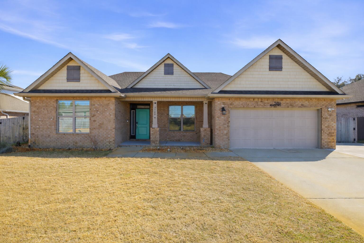 Beautifully maintained all-brick home offering 4 bedrooms plus an office/bonus room or optional 5th bedroom, 3 full baths, and 2,942 square feet of thoughtfully designed living space. Step outside to your private oasis featuring a 2025 gunite pool, hot tub, cabana, patio, storage building, and ready-to-plant garden boxes. This spacious open floor plan features numerous upgrades and is ideal for everyday living and entertaining. The living room features soaring vaulted ceilings, tall windows for natural light, and in-ceiling surround sound speakers. The expansive kitchen includes a large island with bar seating, stainless steel appliances, a butler's pantry, and a walk-in pantry. Luxury vinyl plank flooring runs throughout all main living areas, complemented by tall baseboards, crown molding, and tray ceilings. The split bedroom layout provides privacy for owners, family, and guests with separate full baths in each area. The oversized primary suite includes a sunroom extension, custom walk-in closet, garden tub, and separate tiled shower. The home is situated well above flood zones for added peace of mind. Additional highlights include an energy-efficient solar attic fan, ample attic storage, gutters, and French drains. The upgraded garage features LVP flooring, custom cabinetry with granite countertops, 12 recessed lights, a ceiling fan, and an insulated garage door--ideal for a workshop, home gym, or extra storage. Conveniently located near shopping, dining, and A+ rated schools in the Gulf Breeze School District, and just minutes from Pensacola Beach and Navarre Beach. Schedule your private showing today!