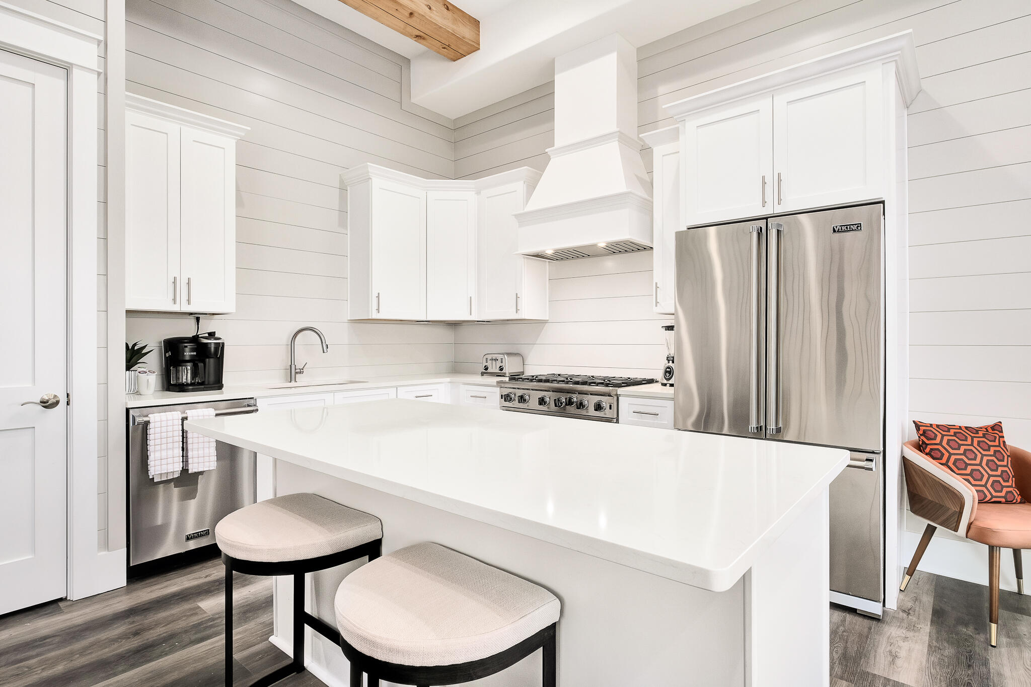 $20,000 FURNISHING ALLOWANCE OFFERED BY SELLER TO BE PAID AT CLOSING. 

Steps to the beach in the heart of Seagrove, this home has a modern aesthetic with warm, coastal touches throughout. The main floor maintains an open concept from the kitchen to the living area that carries out to a balcony space with Gulf views. The fully equipped kitchen features a large island for additional preparation or serving space and offers bar seating that is perfect for entertaining large parties after a day at the beach. Fully stocked, the kitchen showcases stainless steel Viking appliances and is gas friendly. On this floor you will find 2 bedrooms, each with their own en-suit. Additionally, there are 2 laundry spaces for added convenience, one on the main level and one on the third And, as an added bonus there are 2 twin, built-in bunk beds for guest use or relaxation. The third floor has four bedrooms and three full bathrooms, with bedrooms 5 and 6 sharing a Jack and Jill style bathroom with walk-in shower.  The Primary bedroom is nearest the front of the home to highlight the beautiful gulf views from a private balcony. The Primary has a private en-suite with dual vanities and a large walk-in shower with glass enclosure. Head downstairs to enjoy a large outdoor space with a to covered patio, heated swimming pool, outside shower, and grilling area.  This space is tiled throughout and provides an outdoor dining area perfect for entertaining. There is additional storage and an owners closet, as well as, the elevator entry on this entry floor. The home as a single, covered carport space and 2 additional driveway spaces for parking. Cote D'Azur maintains private beach access directly to Seagrove Beach, a short walk across the street from the property. This area is golf cart friendly and is in close proximity to many local restaurants and shops. 

Special features include but are not limited to: 5 King beds in each spacious bedroom plus 2 twin bunks perfect for peak rental potential. Each bathroom maintains stunning tile shower detailing with glass enclosures. With three floors, the home has an elevator for easy accessibility. Luxury Vinyl Plank can be found throughout the home with iron railings showcasing the staircases to add a modern flare. Lastly, the patio area has a stucco privacy fence surrounding for optimal seclusion. 

The neighborhood is short-term rental friendly and the home currently is on a vacation rental program, self managed. The home is being sold fully furnished. Start your permanent vacation, today! Seller financing options available.