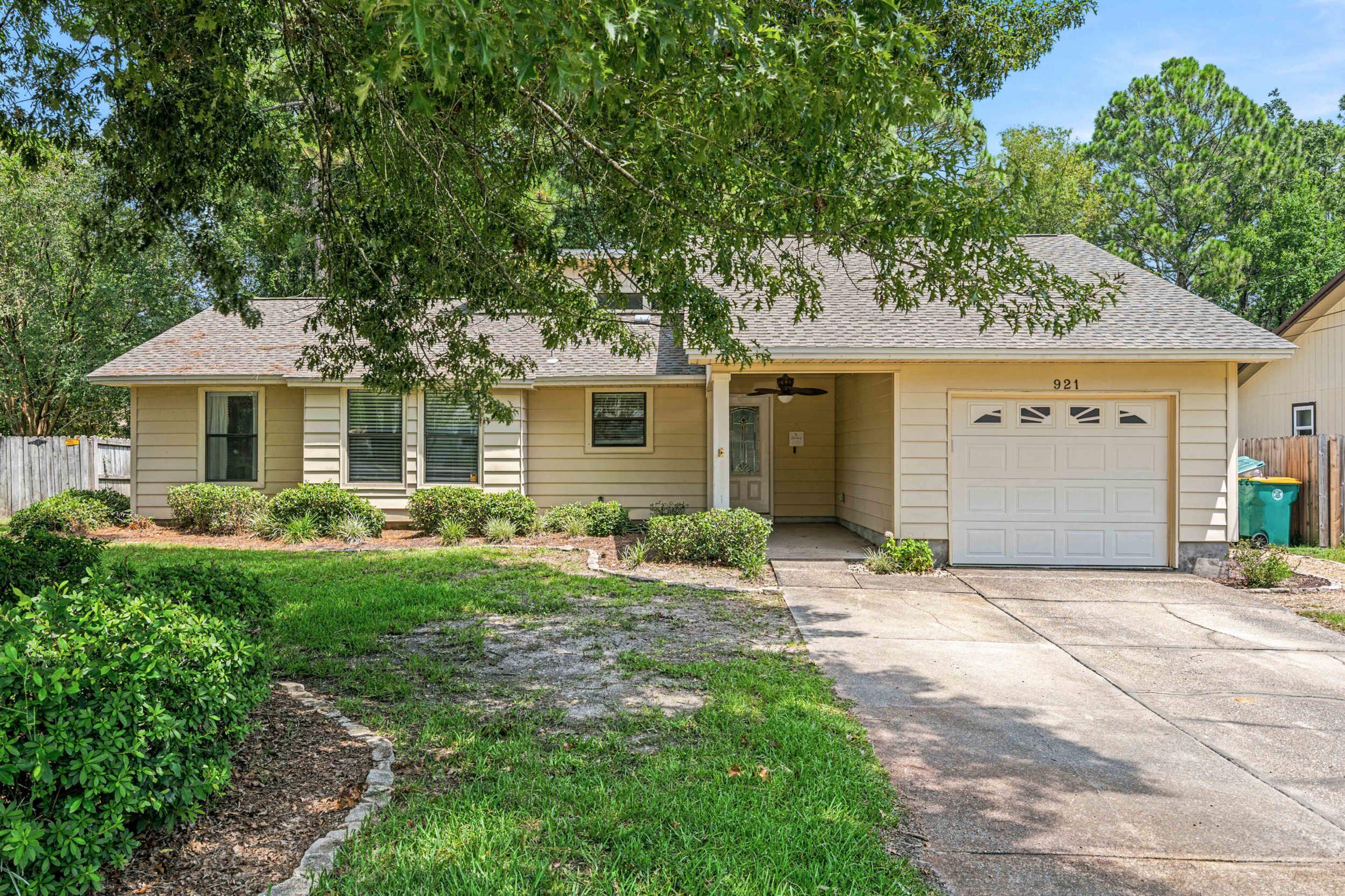 Welcome to 921 Nutmeg Avenue, where tucked-away neighborhood charm meets easy Niceville living. Set toward the end of a quiet street on a level .26-acre lot, this 3-bedroom, 2-bath home offers 1,403 square feet of comfortable living space. Beautifully maintained and carefully updated, it ensures an easy move and limited weekend projects. Step inside to a bright, welcoming living room featuring a vaulted ceiling and fireplace, the kind of space that feels equally suited for a quiet night in or a house full of friends. The kitchen keeps things functional and inviting with granite countertops, generous cabinetry, and plenty of workspace.
And then there's the Florida room. Surrounded by windows and filled with natural light, this versatile space gives you room to stretch out, whether you're dreaming of a second living area, home office, playroom, entertaining space, or simply somewhere to enjoy a little extra Florida sunshine. Step outside to the large back deck overlooking the fenced backyard, where the possibilities for outdoor living are wide open.
The carpet-free floor will make it easy to keep up with the Florida sand. An attached one-car garage adds convenience and storage, too.

Best of all, you're convenient to the schools, shopping, dining, parks, and everyday conveniences that make Niceville such a popular place to call home while still enjoying the tucked-away feel of a quiet residential street. The best of every world!