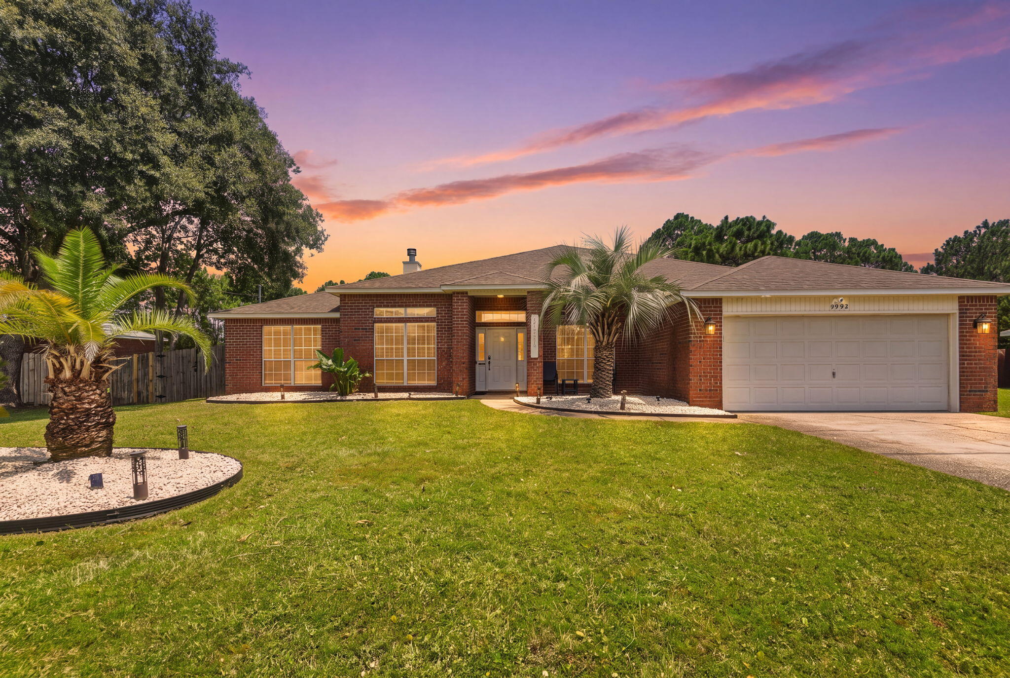 Welcome to your Florida retreat in Holley by the Sea! This 4-bed, 3-bath home offers a combination of space, privacy, and versatile layout that works as a primary residence, vacation home, or income-producing rental opportunity. A NEW ROOF installed in August 2026 adds peace of mind for the next owner.

The split-bedroom floor plan features a spacious great room with hardwood floors, fireplace, and French doors to the patio and expansive backyard. A separate den and formal dining area provide even more flexibility for everyday living.

The kitchen features granite countertops, stainless steel appliances, recessed lighting, and a large center island. The adjoining breakfast area overlooks the backyard.

The primary suite is tucked away in its own wing and features hardwood floors, tray ceiling, and French doors leading directly to the patio. The primary bath includes dual vanities, two walk-in closets, jetted bathtub, and tiled shower.

Three additional bedrooms and two full baths are located on the opposite side of the home. One guest bedroom features its own private en suite bath and convenient patio access.

Holley by the Sea provides community amenities to include three swimming pools, fitness facilities, sauna and steam rooms, a boat launch and dock, and more.
Whether you're searching for a full-time residence, a Florida vacation getaway, or a property with rental-income potential, this home offers the space, flexibility, and lifestyle to make it your own!