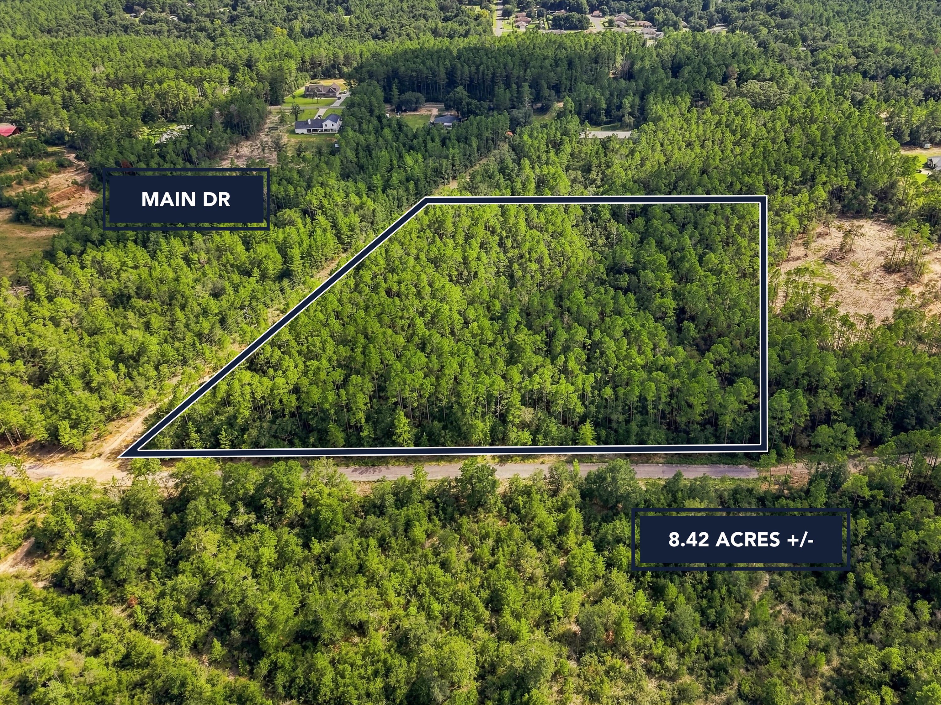 Rare opportunity to own 8.42 acres in Crestview while remaining close to everything! Located on Main Drive, just one road off Airport Road, this spacious homesite offers the privacy and room you've been searching for without sacrificing convenience. Shopping, dining, grocery stores, schools, and other everyday amenities are only minutes away. With paved-road access and plenty of space to create your ideal home and outdoor retreat, this property offers the perfect balance of seclusion and in-town living. Lot and construction financing options may be available for qualified buyers, including potential low-down-payment programs. Bring your vision and start planning your dream home today!