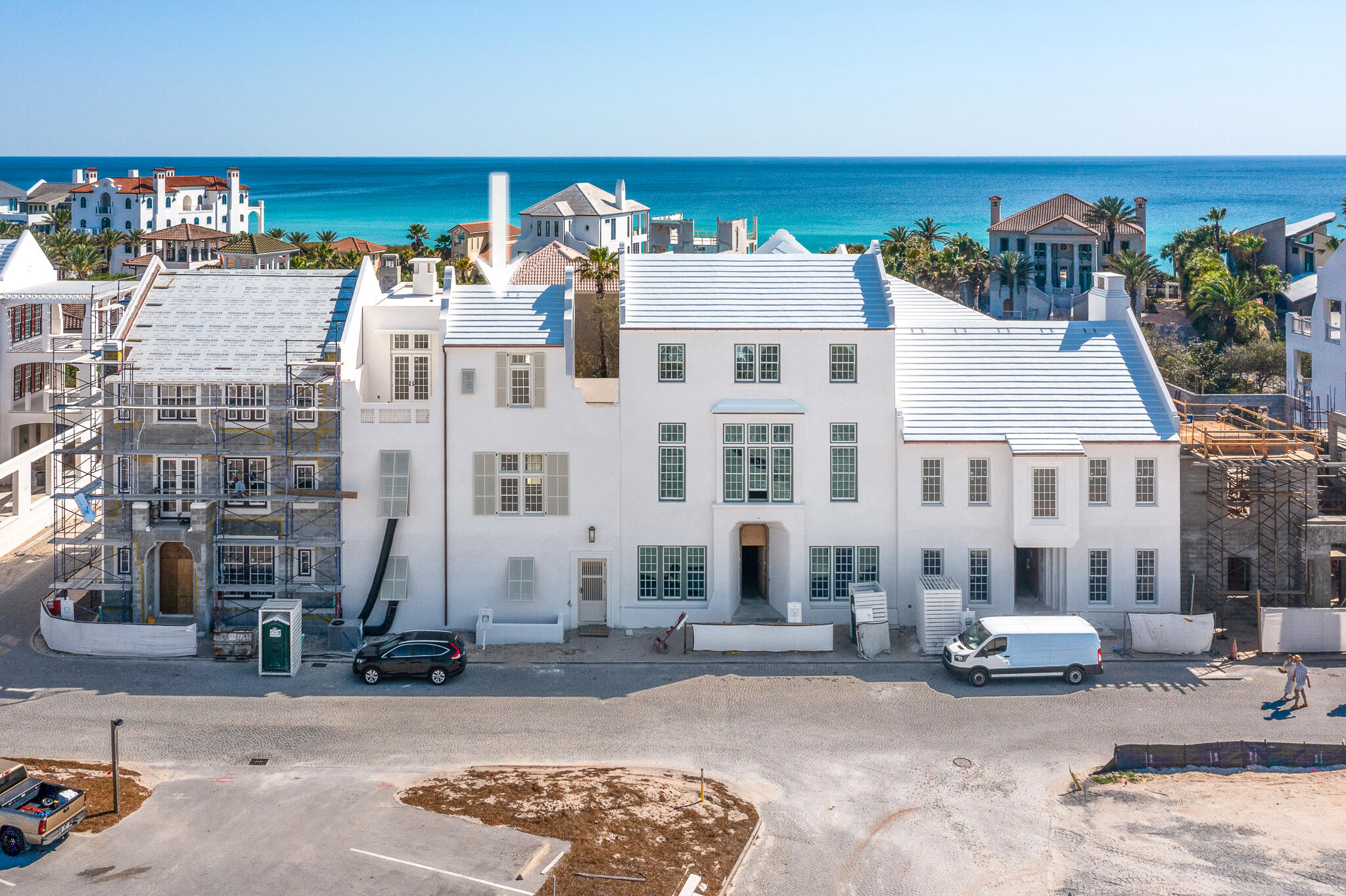 Welcome to 117 Elbow Beach Road, a breathtaking masterpiece, newly constructed home in Alys Beach, designed by the esteemed Architect Gary Justiss. This luxurious residence seamlessly blends modern elegance with coastal charm, offering an unparalleled living experience. Gary Justiss personifies the elegance of the Bermudan architecture Alys Beach procured. Spanning an impressive 4,378 square feet over two and a half stories, this home boasts stunning water views of the Gulf of Mexico. With five elegantly appointed bedrooms, each featuring en suite bathrooms, and three powder rooms strategically located on every level, this residence ensures comfort and privacy for family and guests alike. Venetian Plaster walls travel with you throughout the home.

The first floor welcomes you with three exquisite guest suites that open directly to a private courtyard, complete with a shimmering swimming pool, sun terrace, and exterior powder room with shower--perfect for effortless outdoor entertaining. Ascend to the second floor, where the layout is nothing short of extraordinary. Here, you'll find a generous primary suite that exudes luxury, featuring a lavish dual vanity bathroom adorned with beautiful marble tile and a spacious shower, complemented by two expansive closets.

The main living area is an entertainer's dream, showcasing a gourmet kitchen, dining room, and living room, all anchored by a cozy fireplace and a fully equipped wet bar plus Butler's pantry. Large-scale windows and  sliding doors bathe the space in natural light, creating an inviting atmosphere. This level also features one of three captivating terraces, seamlessly integrating indoor and outdoor living with a dining area under the stars and a summer kitchen, perfect for al fresco dining.

The third floor is a true highlight with elevator access, offering two stunning rooftop terraces, the fifth guest bedroom, and a spacious living room that opens to a vast rooftop terrace. Here, you'll be captivated by panoramic water views and the iconic rooftop architecture that Alys Beach is renowned for. A full bar island, complete with a beverage center and ice maker, ensures that your outdoor gatherings are as luxurious as they are enjoyable.

This property is truly unparalleled, presenting an exceptional opportunity for full-time living or a lavish vacation retreat. Experience the pinnacle of luxury coastal living at 117 Elbow Beach Rd. Your dream home awaits!