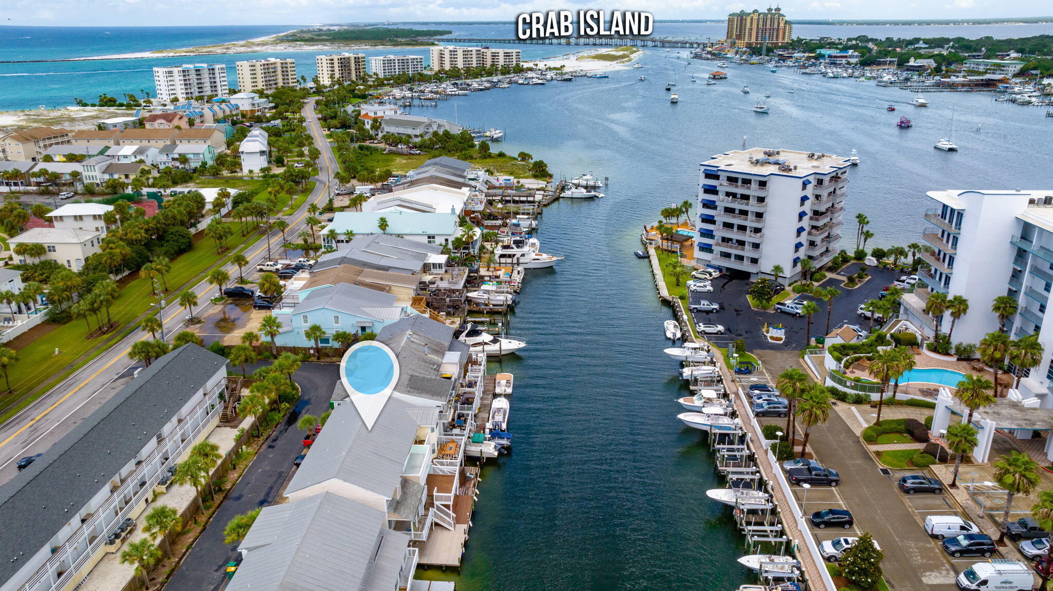 Destin/Holiday Isle Waterfront Townhome with Private Dock & Harbor Views

Experience the best of waterfront living in this canal-front townhome on sought-after Holiday Isle. Enjoy breathtaking views of the Destin Harbor from the 3 exterior decks while taking advantage of the convenience of docking your boat right in your backyard.
Relax and embrace the waterfront lifestyle from one of two spacious decks or the upstairs balcony--perfect for morning coffee, sunset cocktails, or entertaining family and friends. Cast a line right from your deck, launch your boat from your private dock, and cruise to Crab Island in just minutes.
Inside, you'll find beautiful bamboo flooring throughout the bedrooms and tile flooring in the main living and dining areas. The stackable washer and dryer are conveniently located on the bedroom level for added convenience. A downstairs half bath, not included in the listed square footage, offers easy access from the lower deck after a day on the water.
Whether you're looking for a primary residence, vacation home, or investment property, this townhome offers exceptional versatility. Short-term and long-term rentals are permitted, creating income potential. Best of all, there is no building HOA, providing added flexibility and fewer restrictions.
This is a rare opportunity to own a waterfront townhome in one of Destin's most desirable locations. Spend your days boating, fishing, paddleboarding, or simply relaxing while enjoying spectacular harbor views