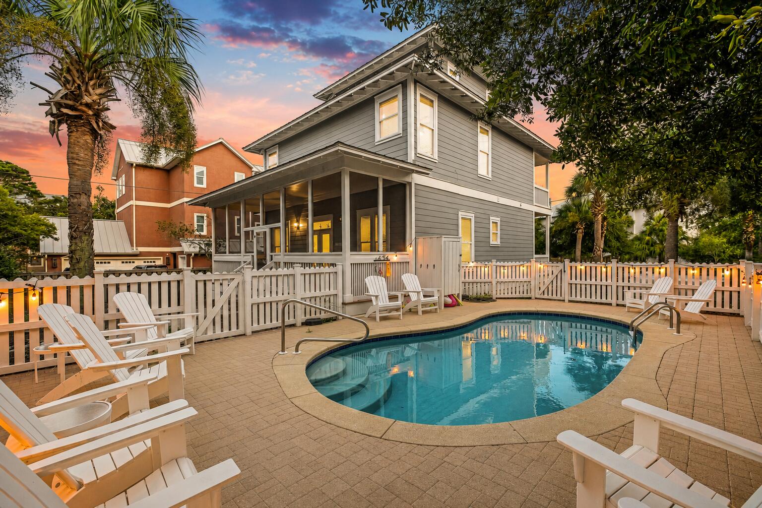 Just 100 yards from the Gulf and moments from the heart of Seaside, this three-story Seagrove Beach residence captures the kind of 30A lifestyle buyers come here looking for: effortless beach access, sunset views, and a location that places the best of the coast right outside your door. Deeded beach access leads straight to the sugar-white sand, while multiple second- and third-floor porches frame Gulf views and evening skies in every shade of sunset. Covered outdoor living creates a natural extension of the home, whether it is morning coffee above the palms or winding down after a day at the beach.

Inside, the home is bright, open, and designed for easy coastal living. Hardwood floors run throughout, while oversized windows fill the interiors with natural light. The kitchen anchors the main living space with stainless steel appliances, generous prep space, and a breakfast bar that keeps the room connected whether hosting a crowd or settling in for a casual weekend.

Five bedrooms and four full baths offer plenty of room for family and guests, while the private pool and fenced backyard create a retreat of their own. Professional landscaping and mature palms bring a sense of privacy and polish to the outdoor spaces.

Beautifully maintained, thoughtfully decorated, and positioned in one of Seagrove's most desirable pockets, this is a home that delivers on both location and lifestyle. Walk or bike to Seaside, spend the afternoon at the Gulf, come home to the pool, and watch the sun drop from the upper-level porches.

This is 30A living exactly as it should be.
