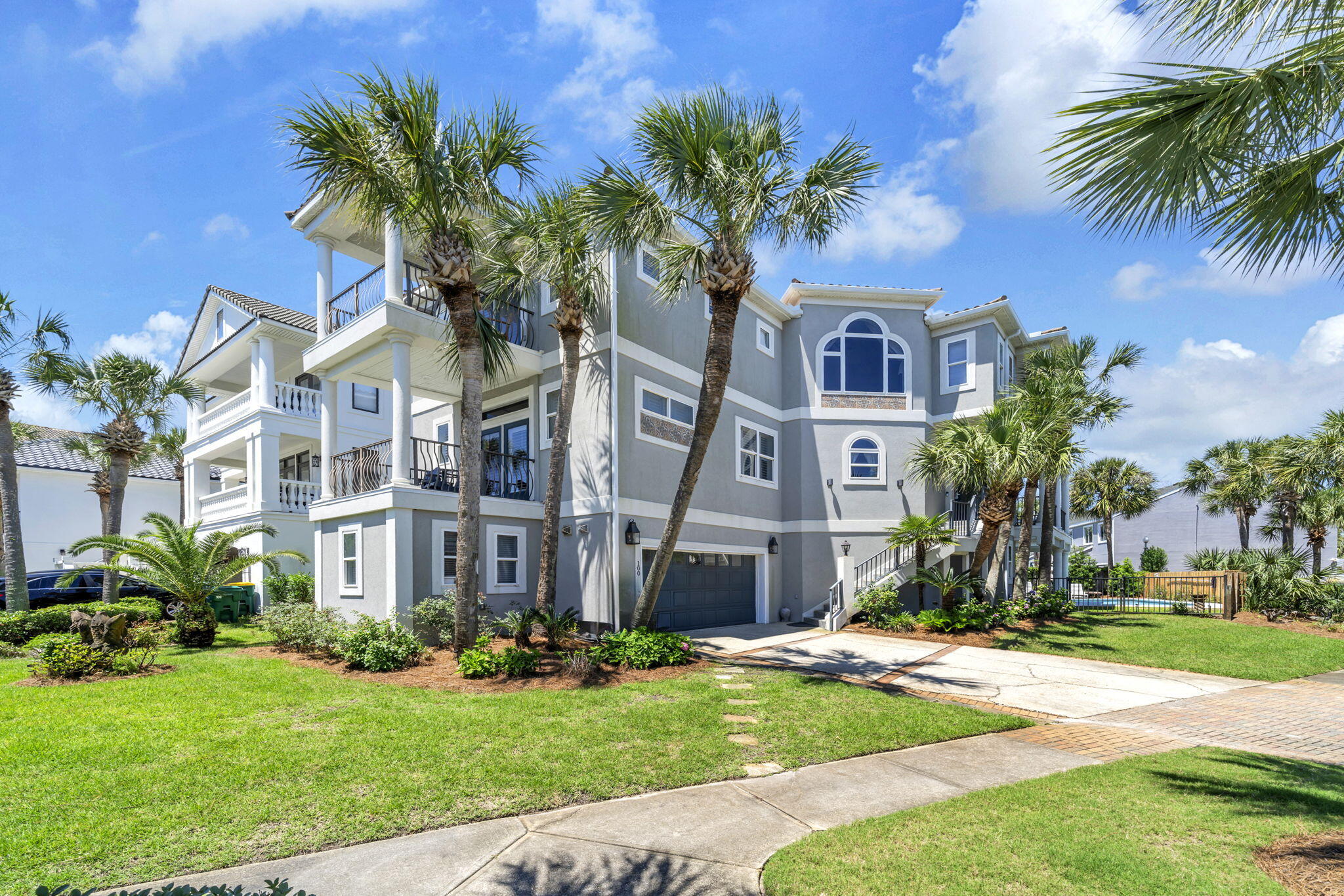 Highly popular, solid 5-star, vacation rental with stellar history. Proven revenue over seven years under current owner. Property has advantage of 24-occupant rating per Bert Harris Act settlement with city (fourteen is limit under current city regulations). This home easily accommodates several large families with generous gathering and eating spaces and sweeping wrap-around balconies. Every en-suite bedroom has access to fully-tiled veranda, patio or balcony with views to lake and surrounding area. Some peak-a-boo of beach. Villa Emeraude is steps down the sidewalk - no streets to cross -- from Dunes of Destin stunning private beach. This rare private deeded beach access has become even more sought after with recent changes to Florida customary beach usage. Professionally designed, remodeled and decorated, this home features a chef's kitchen as upgraded with hard-to-find gas range retrofit. Ample kitchen storage and pantry for family enjoyment. Wet bar offers zoned wine and beer refrigerator and stand-alone KitchenAid ice maker. Villa Emeraude features larger private pool with new gas heater. Four bathrooms are recently remodeled with lovely updates designed for guest enjoyment and practical family amenities for drying beach items. Two family bedrooms are super-sized and loft has space for foosball and separate TV viewing. Check out the separate video gaming space for kids with Atari and X-Box off of garage. Back patio and pool area feature a grill and outdoor TV. Many families reserve in advance to enjoy making memories in this home year after year.