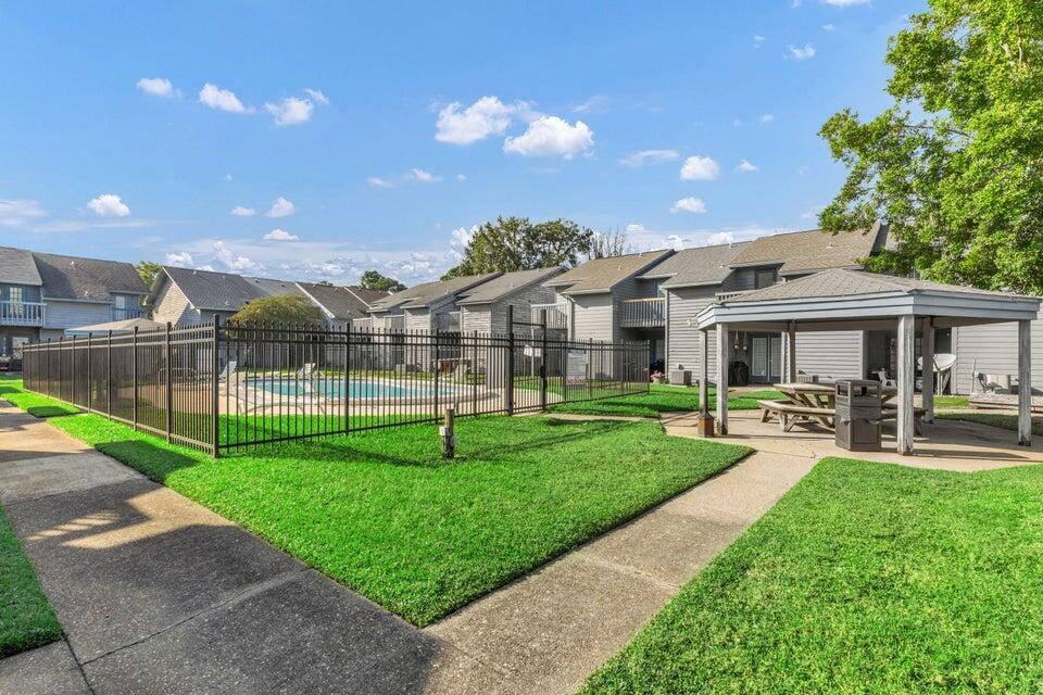 Welcome to a Great Townhome Perfect for Investors. Full bathroom upstairs, half bath downstairs. Large laundry and storage room off kitchen with washer/dryer. Community in-ground pool, picnic area with BBQ Grill, Pavilion and Gazebo just out your back door to enjoy especially during these hot summer days!