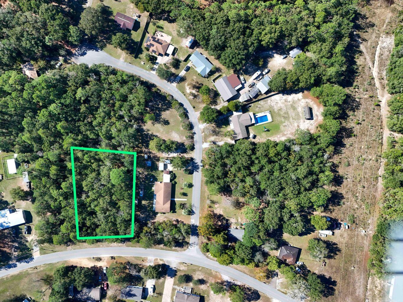 Discover the potential of this 0.52-acre level, cleared lot, offering a peaceful setting with convenient access to town amenities. The property is nicely proportioned and level, making it well-suited for a variety of future building options. City water is available at the road (tap fee not yet paid) and a septic tank would be needed. Based on current information, mobile and manufactured homes appear to be allowed, giving buyers flexible options for development--buyers are encouraged to verify zoning and use requirements with the local authorities. An added bonus: an adjoining lot is also available for sale, creating a great opportunity to expand your footprint, increase privacy, or invest in multiple parcels. The photos are of when the lot was wooded.