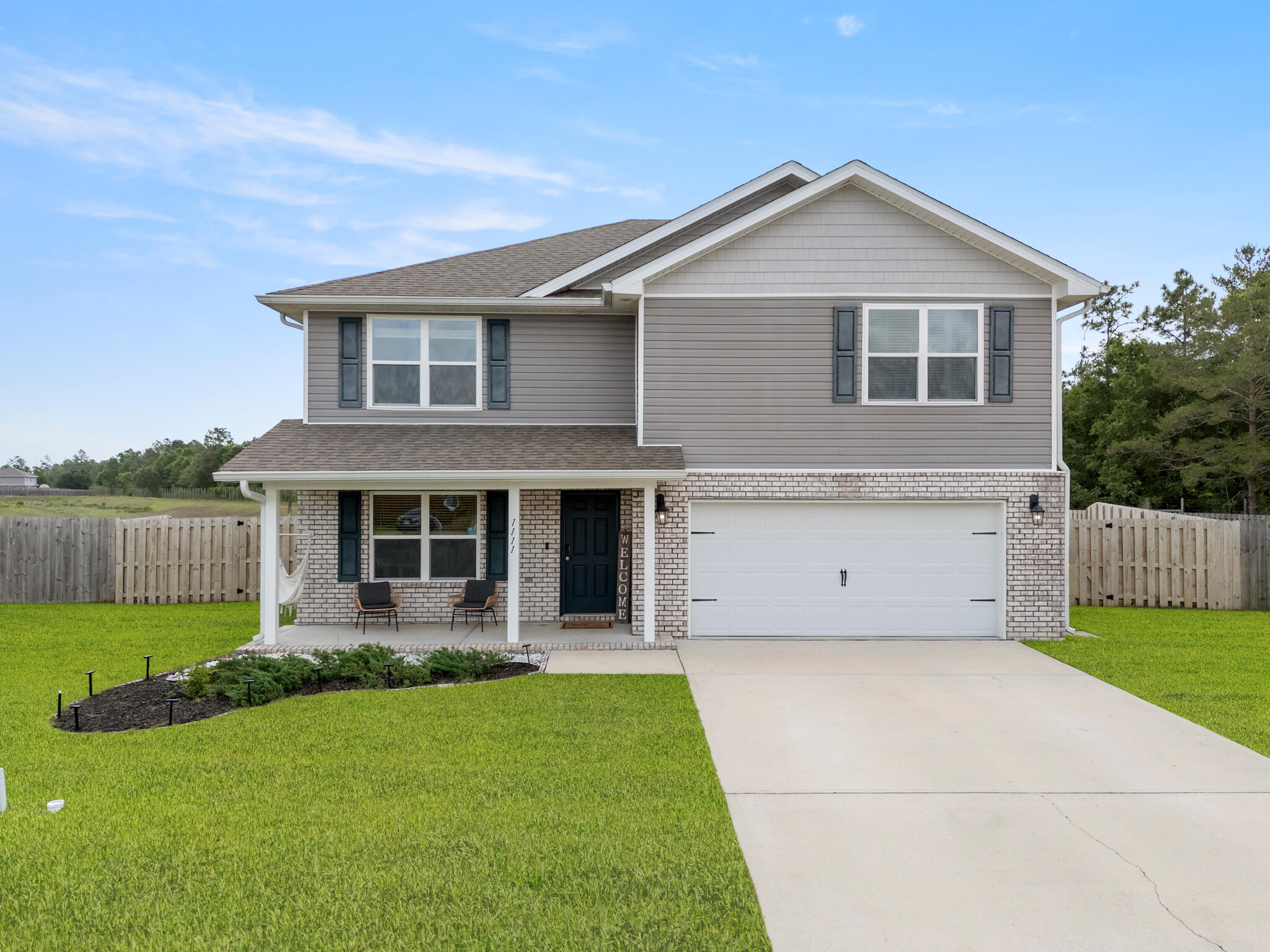 VA ASSUMABLE LOAN AT 2.875% & $10K TOWARDS BUYER'S CLOSING COSTS. 

Tucked away on a quiet cul-de-sac in Redstone Commons, 1111 Capocci Court is the kind of home that immediately feels welcoming the moment you pull into the driveway. Sitting on an oversized quarter acre lot and within walking distance to Riverside Elementary and Shoal River Middle School, this home offers the space, flexibility, and layout that growing families are always searching for.

Step through the front door and you're greeted by a bonus flex space that could easily become your home office, kids' playroom, reading room, workout space, or even a potential sixth bedroom. Whether you work from home, homeschool, or simply want extra room to spread out, this space gives you options from day one.

As you move into the main living area, the home opens up beautifully with a bright, open concept design centered around the kitchen. Picture family gatherings around the oversized granite island, conversations flowing from the kitchen to the living room, and weekends spent entertaining friends while dinner cooks in the background. White cabinetry, stainless steel appliances, recessed lighting, and dark wood-look flooring give the downstairs a clean and modern feel without losing warmth.

Downstairs also features a full bedroom and bathroom, creating the perfect setup for guests, visiting family members, or a private retreat for someone who prefers not to deal with stairs. Upstairs is where the home truly begins to unfold. At the top of the stairs, the oversized loft creates an entirely second living space perfect for movie nights, a gaming area, home gym, or a dedicated spot for the kids to take over. The additional bedrooms are generously sized with large closets, while the primary suite offers the kind of space you'll appreciate at the end of a long day with its oversized walk-in closet, double vanity, and spacious walk-in shower.

Out back is where this home really separates itself. The fully fenced backyard feels built for Florida evenings, complete with a beautifully designed paver patio, built-in fire pit, and custom stone bench seating. It's easy to picture cool nights around the fire, weekend cookouts, kids playing in the yard, and quiet mornings with coffee before the day begins.

With over 2,600 square feet, multiple flex spaces, a highly functional layout, and a cul-de-sac location, this home gives you the room to grow while still feeling comfortable, connected, and inviting from the moment you walk inside.