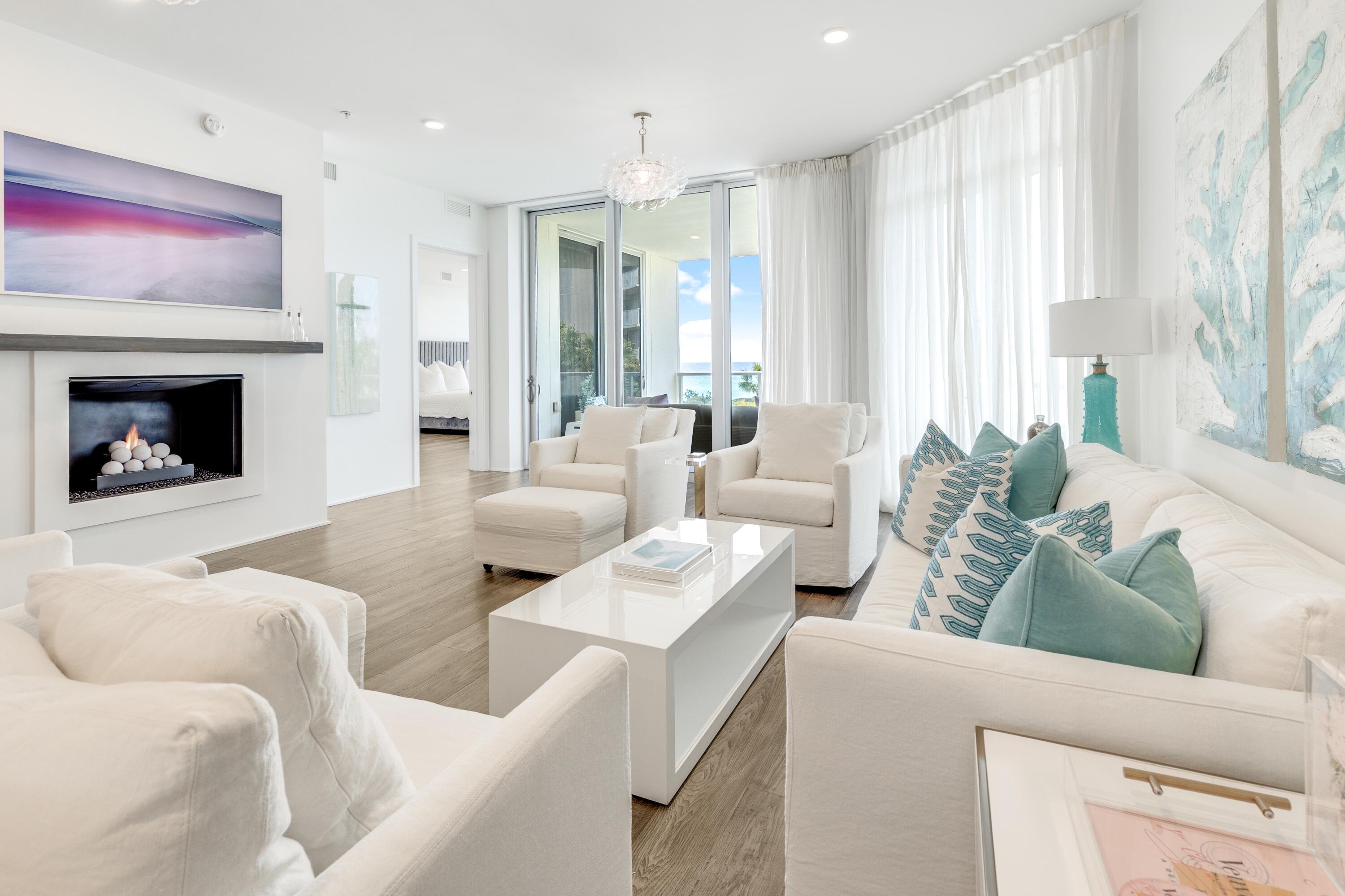 Presiding over 335 feet of elevated, pristine private beachfront, Thirty-One redefines luxury condominium living on the east end of Scenic Highway 30A. Designed to offer the ultimate in exclusivity and privacy, this prestigious residence is perfectly positioned on 3.9 acres of premier Gulf-front property, offering a serene retreat just moments from the best of 30A. Unit 201, the largest corner residence available, is a rare opportunity to own a sophisticated coastal sanctuary with three exterior perspectives, abundant natural light, and seamless indoor-outdoor living. A private elevator provides direct access from the owners-only club room and lobby straight into the residence, offering an unmatched level of convenience and privacy. This same elevator also services the secured underground parking level, ensuring effortless arrivals and departures. Expansive Gulf views create a breathtaking backdrop, complemented by a gas fireplace that adds warmth and elegance to the living space. The kitchen is a true masterpiece, featuring refined European white marble countertops with a dramatic waterfall island, a striking full-wall marble and gold backsplash, and top-of-the-line Wolf and Sub-Zero appliances. A wet bar, complete with a pellet ice maker, wine refrigerator, white marble countertops, and tile accents, offers an additional touch of sophistication. The dining area is enhanced by a sleek wall of custom white lacquer cabinetry, providing both style and functionality. Each bedroom has been thoughtfully designed with custom-fitted closets, including an additional closet in the largest guest suite for enhanced storage. Residents of Thirty-One enjoy an unparalleled collection of resort-style amenities, including a stunning pool, underground secured parking with private storage, a state-of-the-art fitness center, a fire pit area, and a gorgeous outdoor marble grilling station. Complimentary daily beach chair set-ups are provided from March through October, ensuring effortless relaxation on the sugar-white sands of 30A. This is more than a residence it's a statement of refined coastal living. Experience the pinnacle of Gulf-front luxury at Thirty-One.