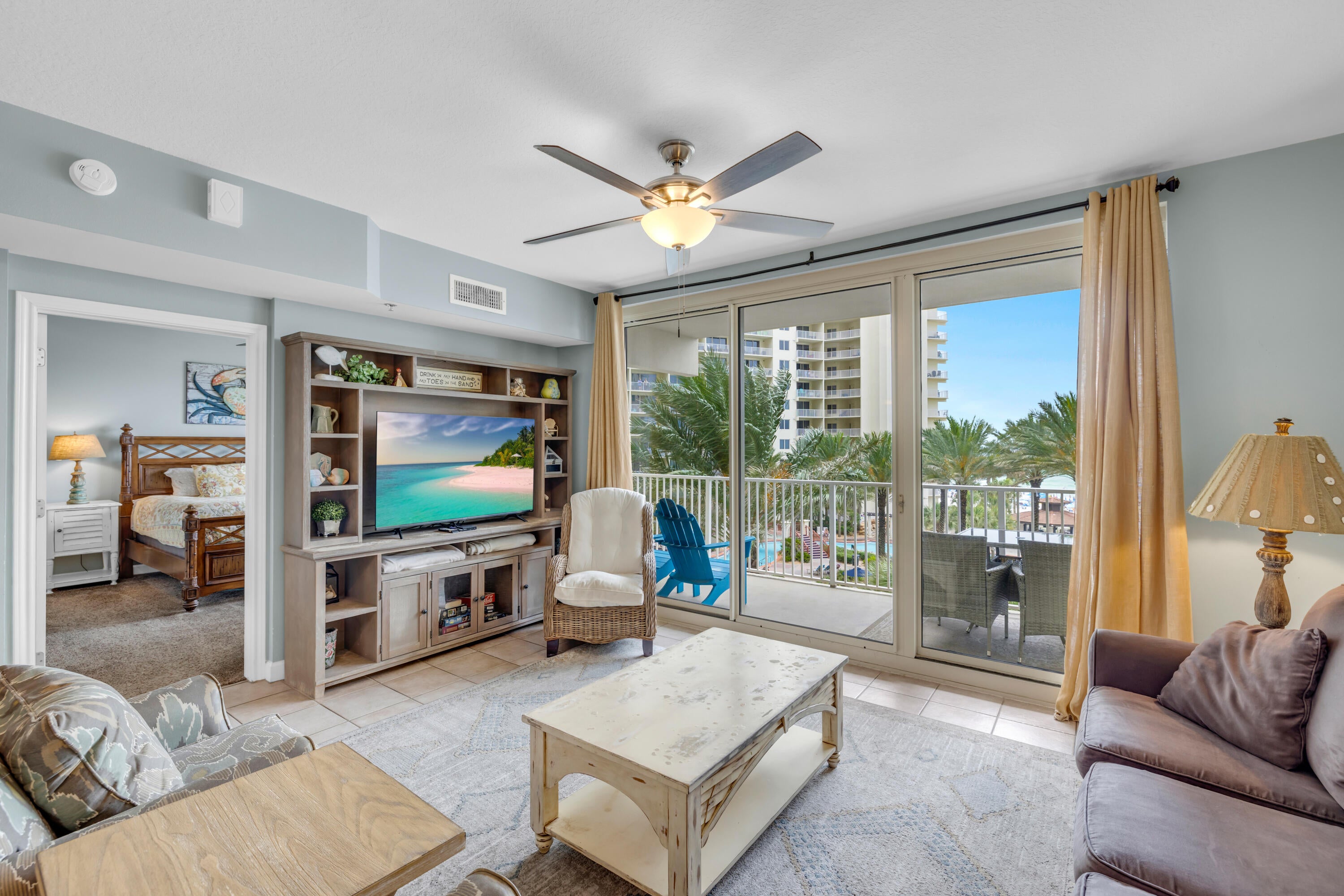 SELLER FINANCING AVAILABLE. 4TH FLOOR CONVENIENCE. DEEDED SAME-LEVEL PARKING.
Shores of Panama Unit 413 features the popular Type C floor plan with a Gulf-front primary suite offering beautiful Gulf views from the window, plus a private bunk room and 2 full bathrooms. Located on the 4th floor, this unit offers lower-floor convenience, resort-style pool views, and reduced reliance on elevators compared with higher-floor units.
The kitchen is equipped with granite countertops and stainless steel appliances and opens to the living and dining areas. The large balcony provides additional outdoor living space with views of the lagoon-style pool and the Gulf-front resort setting. The unit also includes a full-size front-load washer and dryer and is being offered fully furnished and rental-ready.
A deeded parking space located on the same level as the condo, conveniently positioned near the elevator entrance, is a rare and highly desirable feature at Shores of Panama. Same-level parking adds meaningful convenience for owners and guests, especially in a large Gulf-front resort setting. From the covered hallway, access between the unit and parking garage is simple and efficient.
Additional features include a 2017 HVAC system and 2017 water heater. The owner currently self-manages the property, offering flexibility for future owners who wish to continue self-management or select their preferred rental management company. Shores of Panama Resort is known for its expansive Gulf-front lagoon pool, one of the largest in Panama City Beach. The resort-style pool area features zero-entry access, palm-lined islands, fountains, a spacious hot tub, and direct private beachfront access. Additional amenities include an indoor heated pool and hot tub, 24-hour fitness center, and seasonal poolside Tiki bar.
Located in the heart of Panama City Beach, Shores of Panama places dining, shopping, and entertainment nearby. Pineapple Willy's is adjacent to the resort, and Laketown Wharf directly across the street offers several dining, retail, and entertainment options, including Wharf Seafood Buffet, The Candymaker Ice Cream Shop, PCB Pizza, In Cahoots, The Press, The Bun Lab, 810 Billiards & Bowling, salon services, and more.
Panama City Beach has also welcomed several newer attractions and entertainment venues, including Dolly Parton's Pirates Voyage Dinner & Show, Topgolf, McGuire's Irish Pub, and Tootsie's Orchid Lounge. HOA dues are $3,491.71 per quarter. All information is believed to be accurate but should be verified by buyers if important.