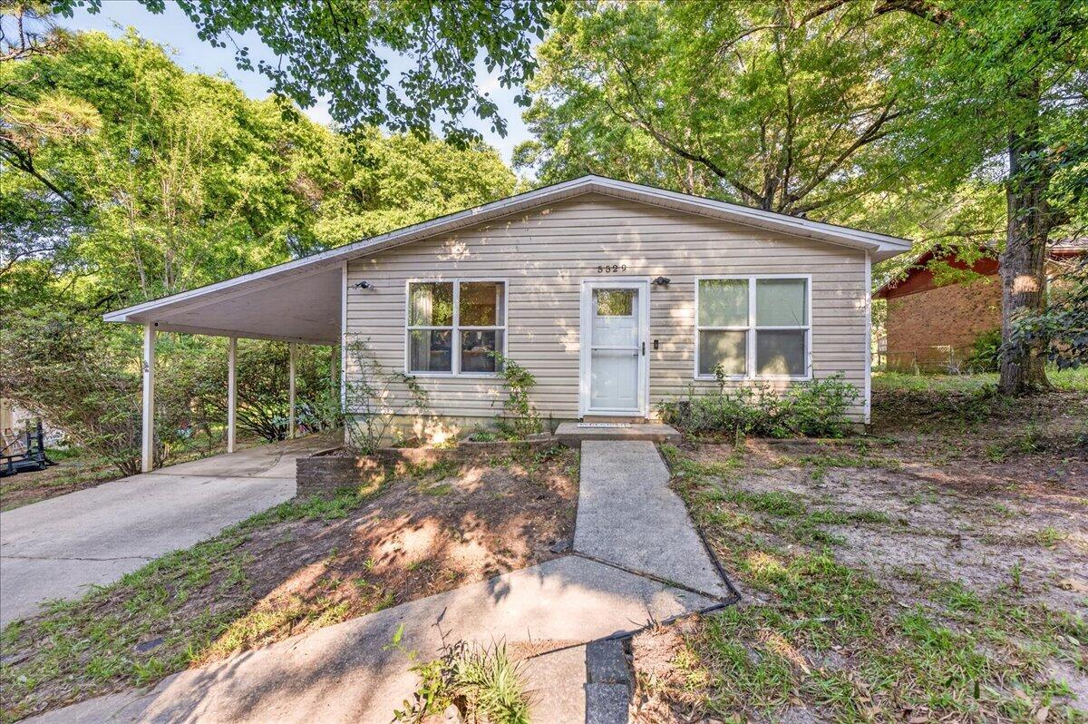 ADORABLE HOME ONLY MINUTES FROM WALKER ELEMENTARY SCHOOL. THIS HOME HAS A LARGE KITCHEN WITH BREAKFAST BAR AND PLENTY OF CABINET AND COUNTER SPACE. THIS HOME ALSO OFFERS A LARGE LIVING ROOM, INSIDE LAUNDRY, BUILT-IN BOOKCASE, CEILING FANS AND SO MUCH MORE! OUTSIDE INCLUDES A FENCED BACKYARD AND A 1/3 ACRE LOT. THERE'S EVEN A 720 SQUARE FOOT STORAGE BUILDING WITH GARAGE DOOR/BAY FOR EXTRA STORAGE SPACE & PARKING THE WORKSHOP HAS A MINI SPLIT WHICH IS INCLUDED (JUST NEEDS TO BE INSTALLED). PERFECT FOR THE WOODWORKER OR CAR ENTHUSIAST/HOBBYIST! CALL FOR MORE INFORMATION!