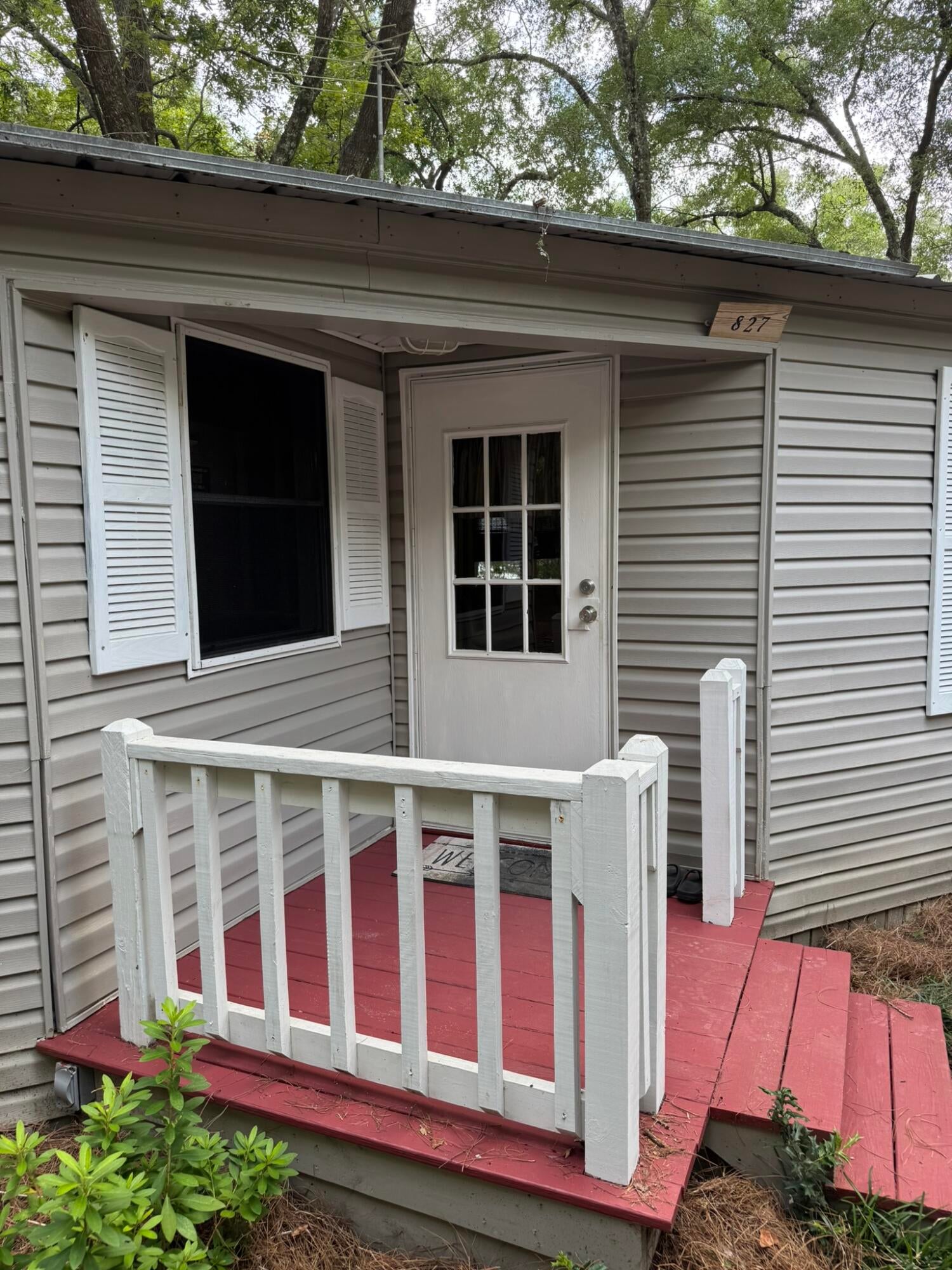 Welcome to your renovated, move in ready waterfront retreat at 827 Squirrel Road in DeFuniak Springs! Located along the  shores of Lake Juniper, this charming home offers the ideal blend of peaceful lakefront living, outdoor adventure, and classic Florida charm. Start your mornings on the spacious screened back porch while taking in serene water views and spend your evenings watching breathtaking sunsets from your brand new private dock. Perfect for outdoor enthusiasts, you can fish right from your own backyard or venture just minutes away to Cat Island Park for swimming, boating, kayaking, and world-class bass fishing. The property also features two versatile outdoor buildings, ideal for extra storage, a workshop, or water gear and can come fully furnished for a turn key move. Located in historic DeFuniak Springs, home to one of only two naturally round spring-fed lakes in the world, this location gives you the quiet beauty of freshwater lake life while keeping you just 45 minutes from the world famous, sugar white sands of the Emerald Coast beaches.