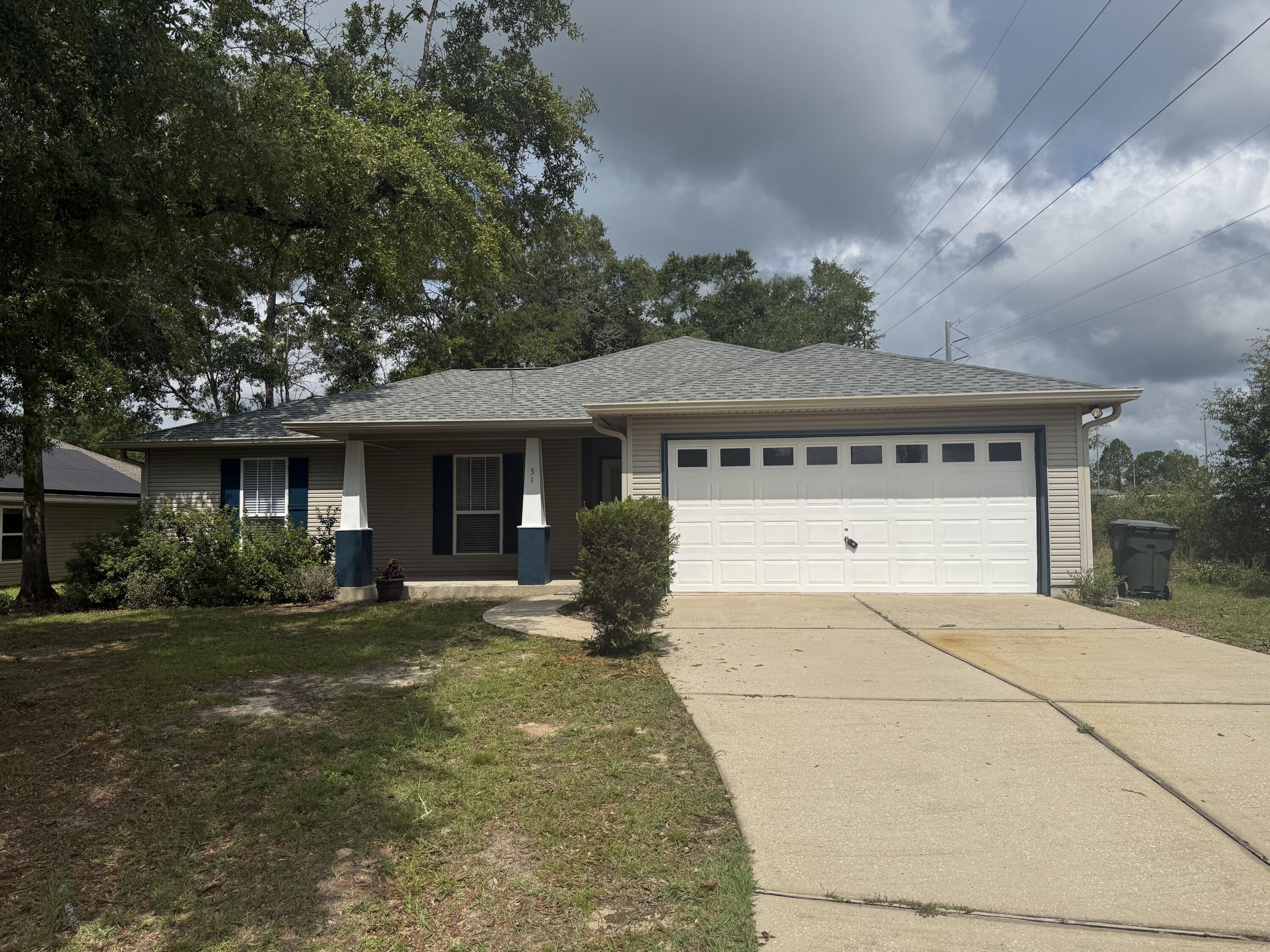 Tucked away on a quiet cul-de-sac, this beautifully updated 3BR/2BA home with two -car garage offers both charm and convenience, just steps from Walton High School! Inside, you'll find a bright, refreshed interior with durable LVP flooring, modern lighting, and a reimagined kitchen featuring quartz countertops, designer finishes, and a full pantry!  The spacious master suite features a double-door entry, double sinks, linen closet, a separate water closet, and a large walk-in closet with a built-in mirror and integrated storage. A new roof and fresh landscaping add to the home's curb appeal, making it completely move-in ready. This home is a perfect blend of style and function in one of DeFuniak's most central locations- close to all city amenities and just a short drive to the beach!