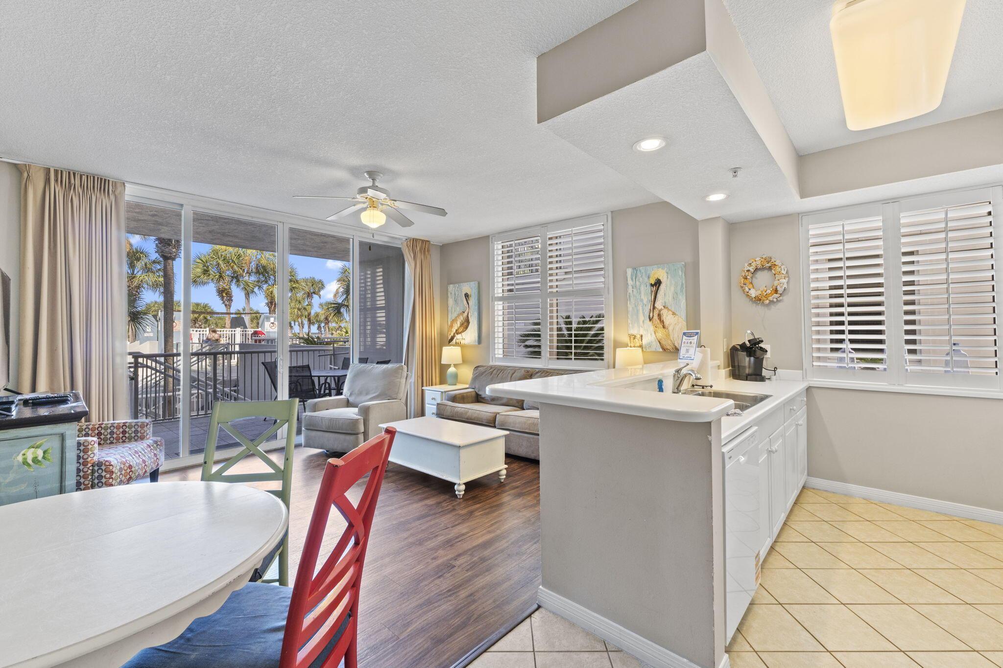 Nestled on the scenic waters of Okaloosa Island just west of Destin, this furnished 1-bedroom with separate bunk room, 2-bath haven offers 971 sq ft of coastal ease and refined comfort. The bright, open living space flows to a private lanai where lagoon-pool and bay views frame each morning coffee and evening breeze. Inside, you'll find upscale finishes and tile flooring in key areas, washer/dryer, and a sleek kitchen ready for casual cooks or entertaining. Located on the bayside of the resort-style complex, you'll enjoy easy beach walkovers, lazy river and spa amenities, and a private garage. With both leisurely bayfront living and quick access to Gulf fun, this unit delivers great Florida lifestyle!