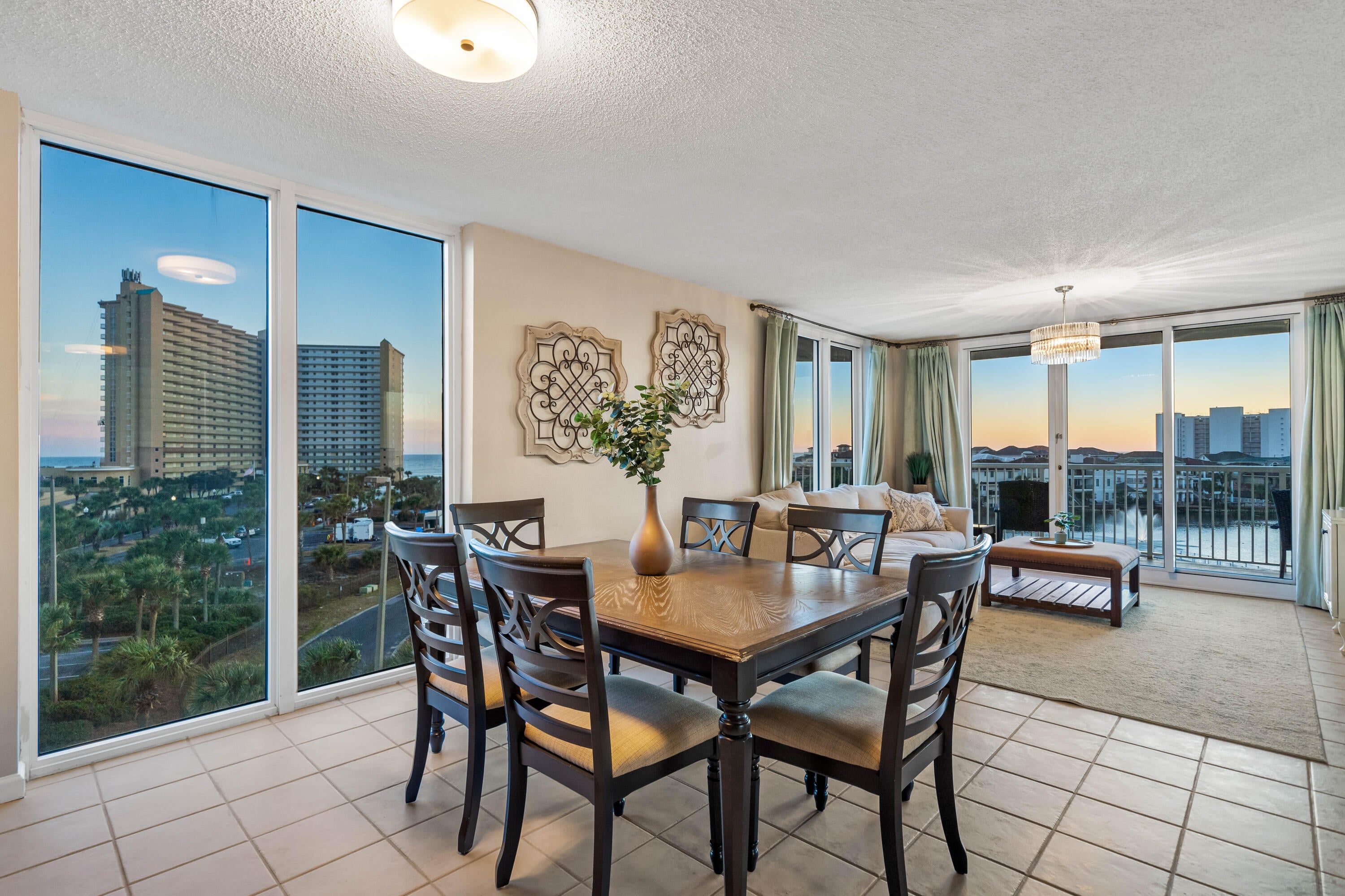 LIVE THE DESTIN LIFESTYLE! This beautifully updated, fully furnished 3-bedroom, 3-bathroom condo at The Terrace at Pelican Beach is the perfect turnkey rental for anyone looking to enjoy coastal living without the hassle of furnishing or setting up a home. Located on the fourth floor and offering approximately 1,400 sq. ft., this spacious residence features two primary suites with private en-suite bathrooms, a fully equipped kitchen, in-unit washer and dryer, stylish furnishings, generous living space, and a large private balcony to enjoy the Florida sunshine. Residents have access to incredible resort-style amenities including private beach access, multiple pools, hot tubs, fitness center, sauna, pickleball and tennis courts, grilling areas, tiki bar, gated community, and on-site security. The location is unbeatable--directly across from Big Kahuna's Water & Adventure Park and within walking distance of Starbucks, Chick-fil-A, restaurants, shopping, and entertainment. Destin's beautiful beaches, HarborWalk Village, dining, and recreation are just minutes away. Water, trash, cable, and high-speed internet are included; tenant is responsible for electricity. Minimum 6-month lease. Whether you're relocating, working in the area, or simply looking for an extended stay in paradise, this fully furnished Destin condo is ready to welcome you home!