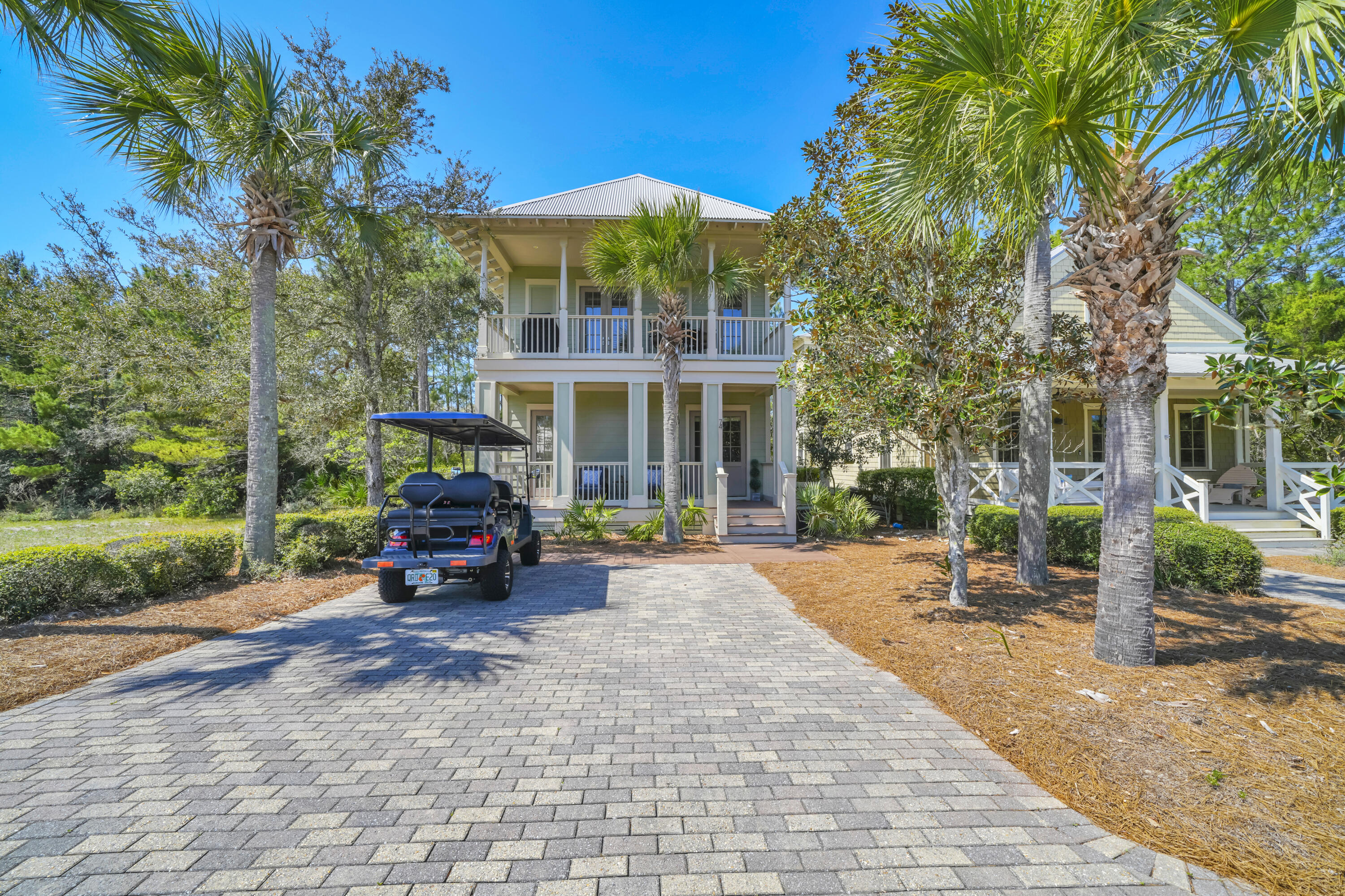 Nestled among soaring cypress trees in the highly sought-after Cypress Dunes on the west end of Scenic 30A (south side), this charming coastal cottage offers the perfect blend of privacy, nature, and beachside living.
An oversized covered Southern-style porch and balcony warmly welcome you into this nearly 1,800-square-foot home. With 4 bedrooms and 4 bathrooms, this rare floor plan provides ample space for family and guests alike. The spacious entryway offers plenty of room to drop your beach bags and kick off your flip-flops after a day in the sun.
The first-floor features three bedrooms, including a master suite, all with en suite bathrooms. The master bedroom is a peaceful retreat, complete with a private screened-in porch overlooking the neighborhood's iconic cypress pond - where the soothing sounds of frogs create a truly tranquil setting. The master bathroom features dual vanities and a large double shower for added comfort and convenience.
Also located on the first floor is a well-appointed laundry room with a folding area, making it easy to prepare for your next beach day.
Upstairs, you're greeted by a spacious open-concept living area that seamlessly combines the kitchen, dining, and living spaces. The kitchen offers ample room for preparing meals, with a generous breakfast bar where family and friends can gather. The dining area comfortably accommodates an eight-seat table, perfect for shared meals or game nights.
The inviting living room features a prominent fireplace and custom built-in bookshelves -- ideal for cozy evenings with a good book or relaxing movie nights. Just off the living area, the main balcony provides abundant seating space for lounging, grilling, and outdoor dining, all while enjoying stunning views of the cypress pond and surrounding wildlife.
Adjacent to the kitchen is the fourth bedroom and full bathroom, along with access to a private balcony -- a perfect spot to unwind and take in the peaceful surroundings.
The property also offers a large driveway with ample parking. Please note: the home includes an additional 1,000 square feet of covered porch space, enhancing its exceptional outdoor living appeal.
Residents of Cypress Dunes enjoy a variety of resort-style amenities, including:
" Two pools, including an infinity-edge pool overlooking the Gulf and Topsail Hill Preserve State Park
" Tennis and pickleball courts
" Fitness center and clubhouse
" Outdoor seating areas with fireplace
" Scenic green spaces
" Elevated boardwalks winding through 200-year-old cypress ponds
This home offers a rare opportunity to experience refined coastal living surrounded by natural beauty and exceptional community amenities.