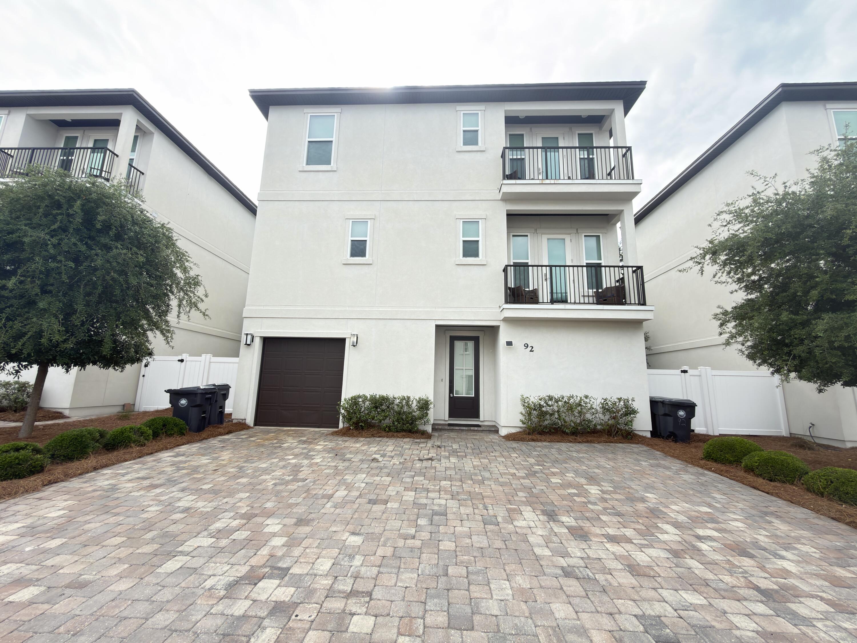 Opportunity abounds with this gorgeous REO property located less than a 1/2 mile to the Gulf of America! Built in 2020, this spacious 2,400-square-foot, 3-story home features 4 bedrooms and 4.5 bathrooms. It is being sold fully furnished and nearly completely turnkey. The thoughtful layout includes a private balcony on both the second and third floors, attached storage, and a fenced backyard. Situated in the desirable community of Hidden Palms, residents enjoy premier amenities including a community pool and included exterior lawn maintenance. Located in an extremely popular vacation rental area, this home is primed and ready for its new owners. Whether you are looking for a personal coastal retreat or your next lucrative vacation rental investment, this incredible property is calling your name. Call today to schedule your showing!