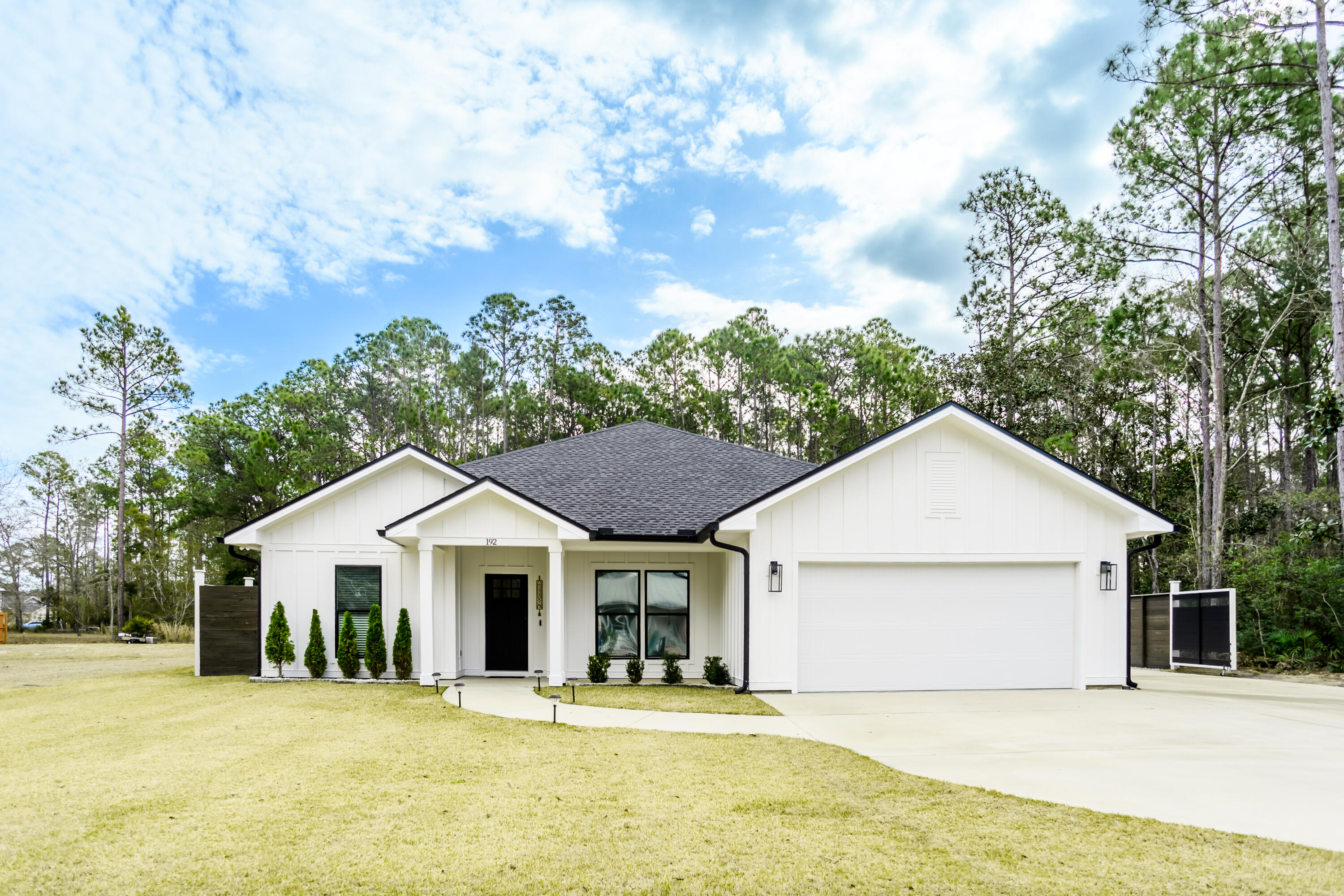 192 Bayou Circle -- where thoughtful design, quality craftsmanship, and impressive outdoor living come together in the heart of booming Freeport! Meticulously maintained and cared for, this beautiful 4 BR/3BA home, built in 2023, offers a clean, modern aesthetic paired with true functionality. Inside, you'll find an open-concept layout featuring a spacious living area that flows seamlessly into a stunning kitchen. The master bedroom offers a private retreat while generously sized additional bedrooms provide flexible space for work or additional living. The expansive backyard features an impressive 19x14 covered pavilion equipped with lighting and mounted TV, creating the perfect outdoor living space. An extra perk---the expansive parking area with room for multiple vehicles, boats, or RV! Additional upgrades include:
-Grinder pump system
-Deep well irrigation for sprinkler system (cost-efficient lawn maintenance)
-10 x 20 storage shed

Located in one of Walton County's fastest-growing communities, Freeport offers easy access to Highway 331, the beaches of 30A and Santa Rosa Beach, and a convenient commute to Destin. With continued growth in retail, dining, and infrastructure, this location delivers both lifestyle and long-term value.
192 Bayou Circle is truly move-in ready, offering exceptional quality and thoughtful design both inside and out!