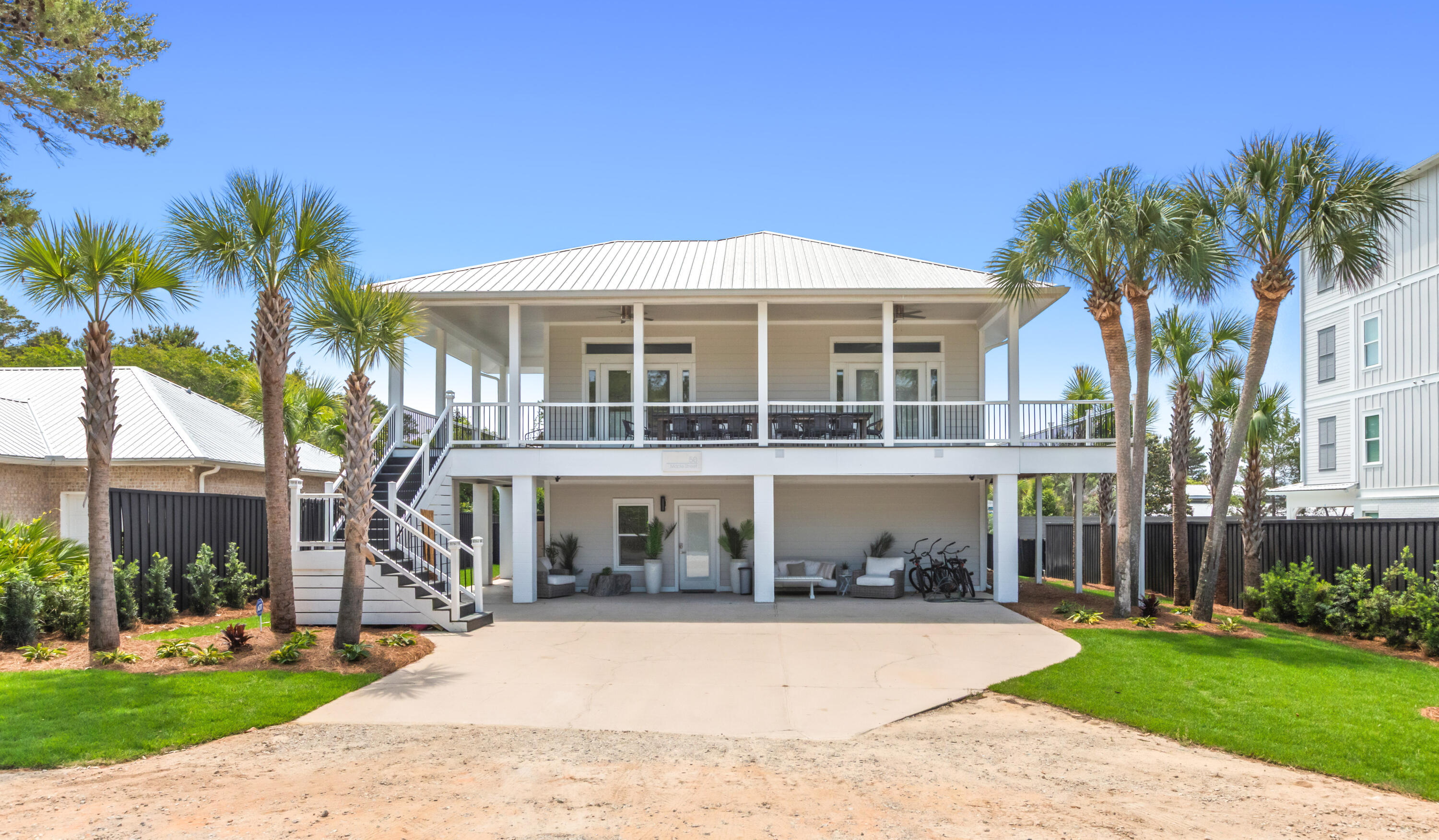 Just a short stroll from the Gulfview Heights Beach Access, this Santa Rosa Beach retreat presents a rare opportunity as a premier vacation rental with over $200,000 in projected rental income or private beach house, defined by an unmatched indoor-outdoor living experience.

Thoughtfully expanded in 2023, the home features an entirely new first floor that added bedrooms and living space -- significantly boosting sleeping capacity and rental income potential while preserving the character of the original design.

A wraparound second-level porch encircles the entire home, offering seamless flow from the interior to multiple outdoor spaces to dine, unwind, and entertain in the Gulf breeze.

The backyard is its own destination: a resort-style custom pool, completed in 2022, anchored by an expansive deck built for sunbathing, gathering, and effortless entertaining. It's the kind of amenity that keeps rental calendars full and delivers a private-resort feel just moments from the sand.

Inside, bright coastal finishes meet a versatile floor plan tailored for hosting family and guests alike.
With the Emerald Coast's sugar-white shorelines, boutique shopping, and favorite local dining just minutes away, this property offers a combination that's hard to find: true beach proximity, fresh turn-key construction, and exceptional outdoor living.