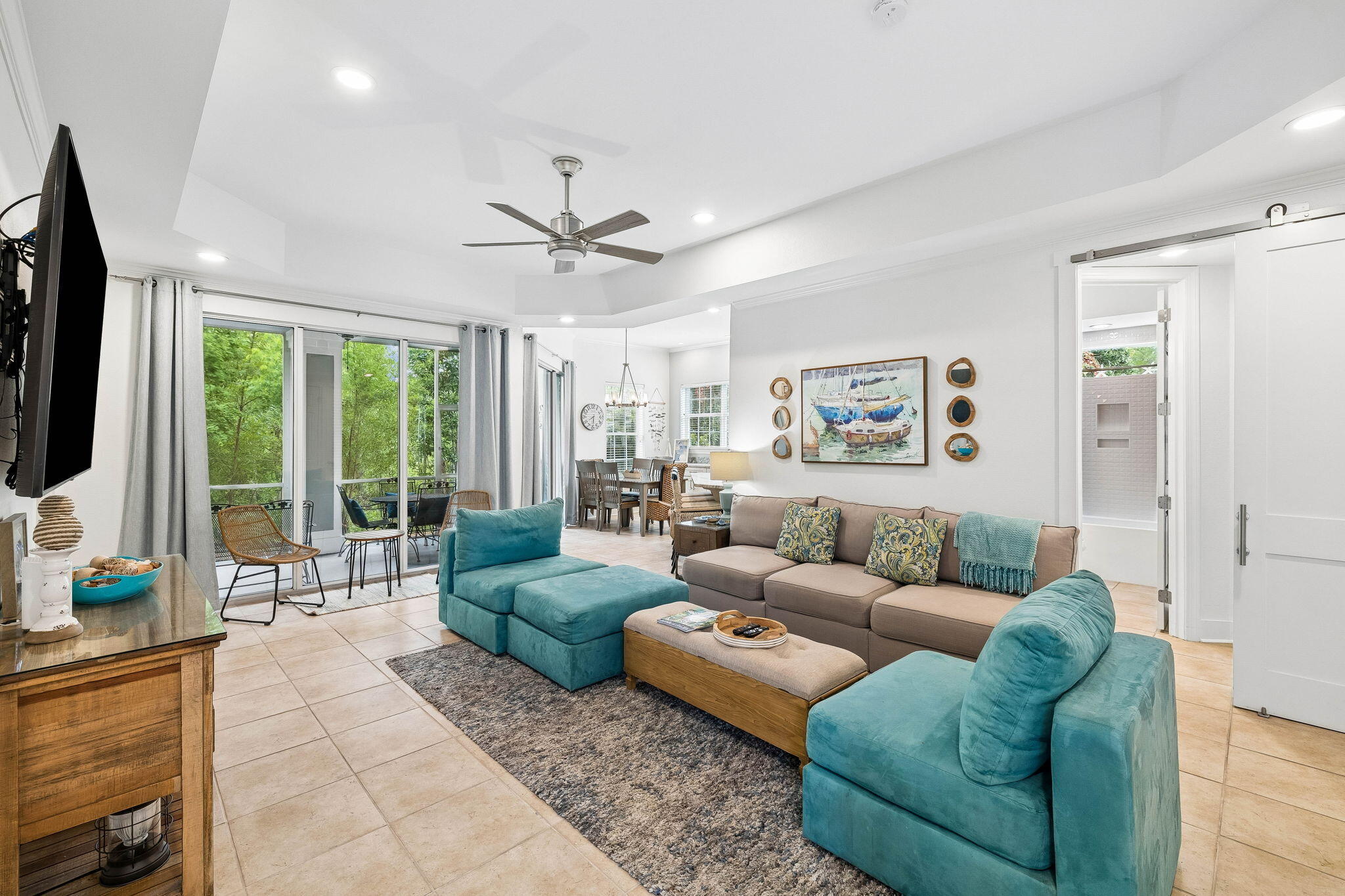 Tucked within the peaceful Crystal Cove neighborhood of Sandestin Golf and Beach Resort, this beautifully maintained and fully furnished 2 bedroom, 2 bath ground floor residence offers a relaxed coastal retreat with a private wooded backdrop and a comfortable, turnkey design ready to enjoy from day one. The open living and dining areas flow seamlessly to a spacious screened porch, creating an inviting extension of the home that is perfect for morning coffee, outdoor dining, or unwinding after a day at the beach. Large windows and glass doors fill the interior with abundant natural light, enhancing the bright and welcoming living spaces. Features include granite countertops, stainless steel appliances, crown molding, generous ceiling heights, and durable tile flooring throughout the main living areas and LVP in the bedrooms for easy maintenance and effortless beachside living. Quietly tucked away in one of Sandestin's more peaceful residential settings while still just a short golf cart ride from all of the amenities Sandestin has to offer.
Spanning over 2,400 acres from the bay to the beach, Sandestin Golf and Beach Resort offers abundant amenities including championship golf courses, tennis and pickleball, biking and hiking trails, a 210-slip full-service marina, and the vibrant Baytowne Wharf for dining, activities, and shopping. Grand Boulevard, featuring restaurants, retail shopping, Starbucks, a movie theater, and Publix Grocery, is just a short golf-cart ride away.
