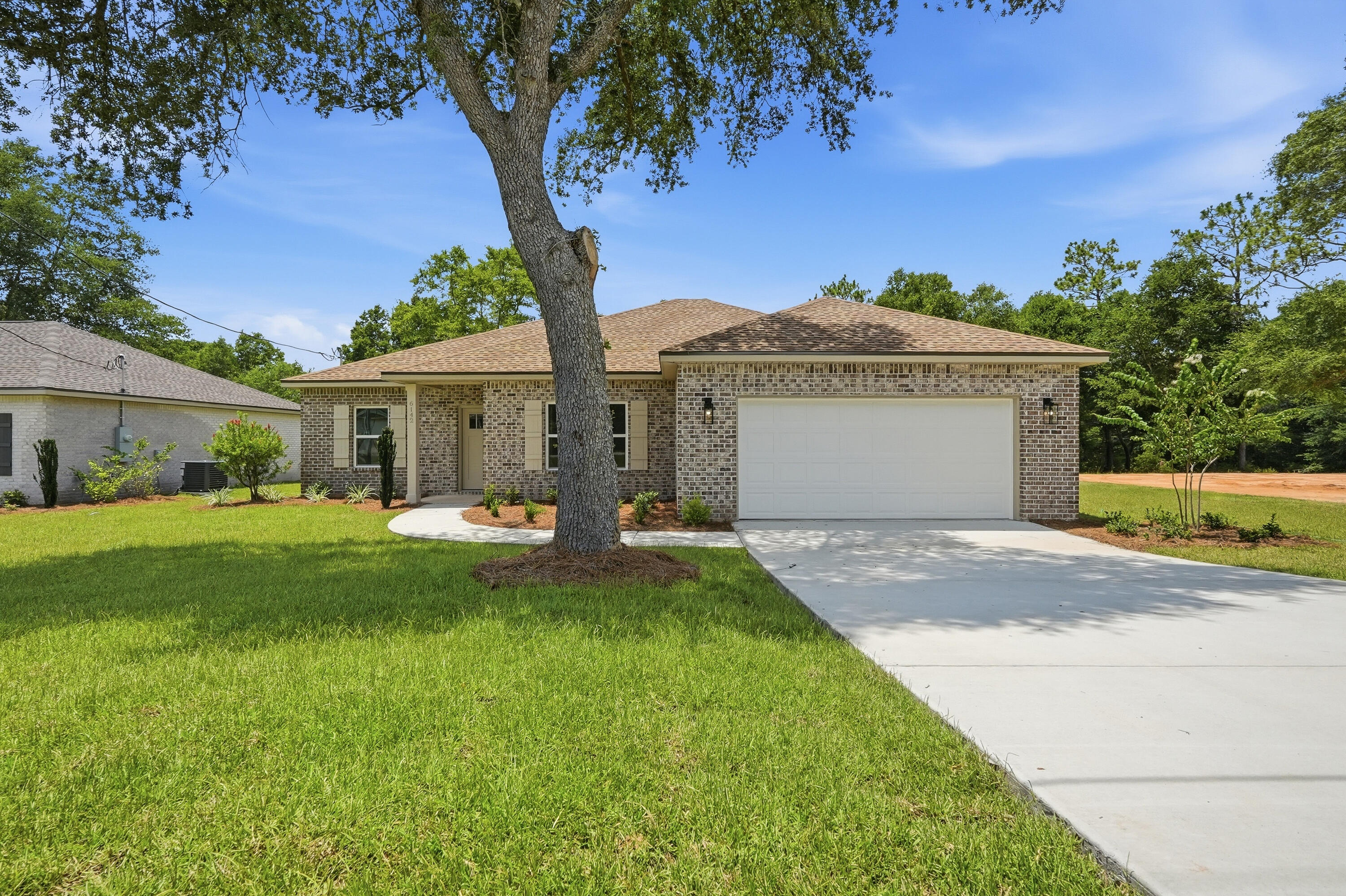 Experience the quality and attention to detail this beautifully new constructed 4 bedroom, 2 bathroom home has to offer. Thoughtfully designed with an open-concept floor plan, this home provides a comfortable flow between living spaces while maximizing functionality and everyday convenience. The builder is offering up to $15,000 toward buyer closing costs, pre-paids, or an interest rate buy-down, creating an outstanding opportunity for buyers looking to reduce upfront expenses. 

The spacious living area features elevated ceilings and abundant natural light, creating a bright and welcoming atmosphere. At the center of the home, the kitchen showcases quartz countertops, a farmhouse sink, a large gathering island, and ample cabinet and counter space, making it ideal for both entertaining and daily living. The private primary suite serves as a relaxing retreat, complete with a tray ceiling, generous walk-in closet, dual vanities, a soaking tub, and a separate walk-in shower. A split-bedroom design offers additional privacy and flexibility for family members, guests, or a home office. French doors from both the living room and a secondary bedroom provide access to the covered rear porch, extending your living space outdoors and creating the perfect setting for enjoying Florida's year-round weather. With no HOA fees, quality craftsmanship, and valuable builder incentives, this home offers an exceptional combination of comfort, style, and affordability.

All dimensions, lot sizes, and property details are approximate and should be verified by the buyer.

For added peace of mind, the builder will provide a one-year builder warranty.