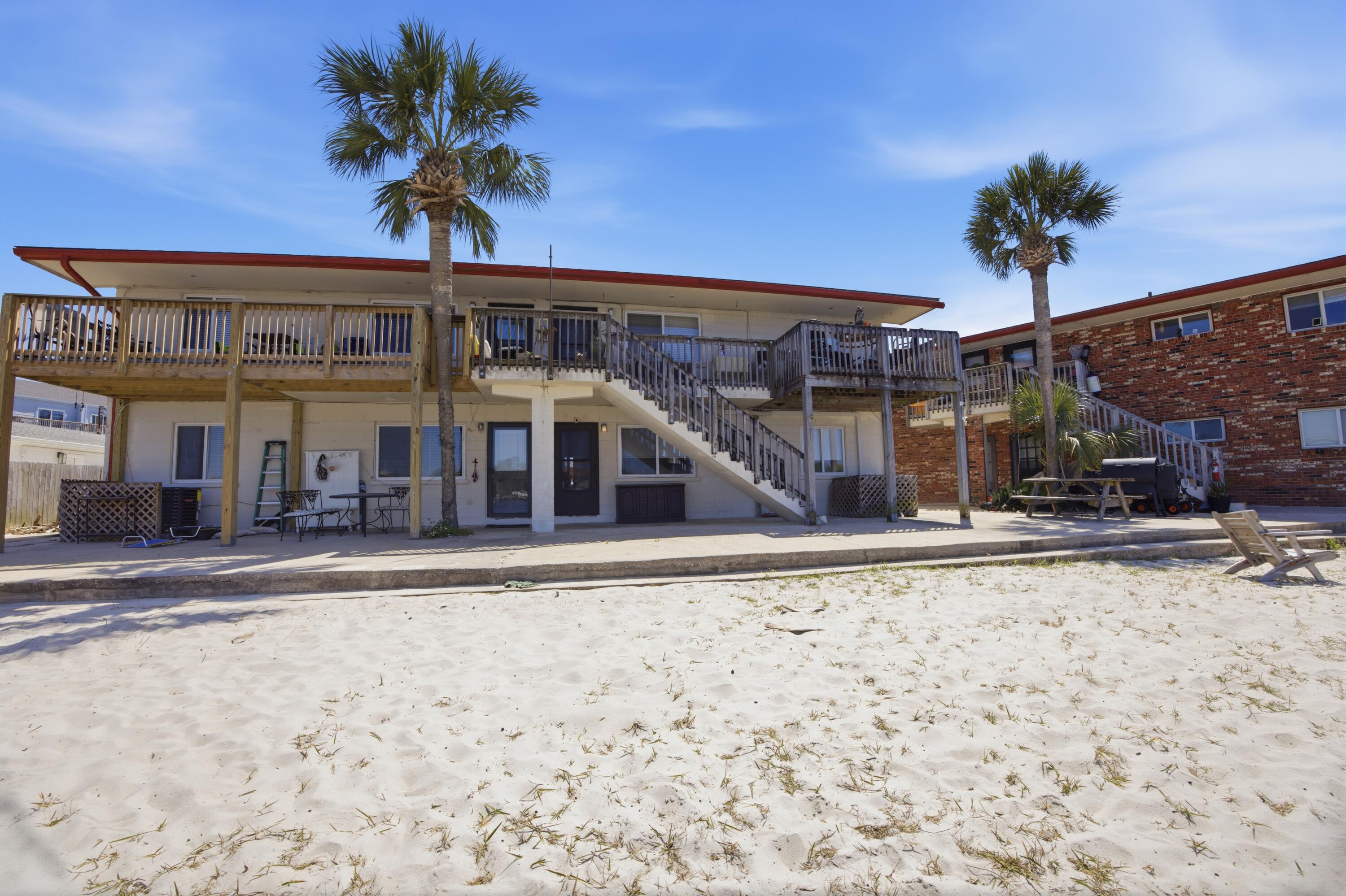 WATERFRONT CONDO ON OKALOOSA ISLAND | VA APPROVED | SHORT-TERM RENTAL APPROVED | LOW HOA
This ground-floor waterfront condo on Okaloosa Island offers practical coastal living with sound side views and strong investment potential. The property includes an assigned boat slip (Boat Slip 102) equipped with water and power, which can be leased to the public for additional revenue if you do not own a boat. The location provides direct water views looking toward downtown Fort Walton Beach, making it easy to watch seasonal fireworks and boat parades from the property.
Inside, the home features tile flooring, fresh paint, redone closet storage, an updated bathroom vanity, and a picture window to maximize natural light. Essential systems have been updated for reliability, including a new HVAC and circuit breaker box (Oct 2024), a water heater installed in 2020, a replaced garbage disposal, keyless entry, and a Ring camera system. On-site community amenities feature a small private beach, a boat launch, and a laundry room. Approved for short-term rentals, VA financing, and paired with low HOA fees, this ground-floor unit sits close to public Gulf beach access, local dining, and shopping. The bathroom has been refreshed with a new vanity, and closets have been redone for improved storage and functionality. A new picture window (installation scheduled for end of April) will further enhance natural light and highlight the setting. Additional features include keyless entry and Ring cameras covering doors and windows, with rechargeable batteries (extra batteries provided). Located on the first floor for easy access, this sound side unit offers tranquil views across the water toward downtown Fort Walton Beach; perfect for enjoying seasonal fireworks and boat parades at the Landing. Community amenities include a small private beach for residents, a small boat launch (currently in works to be repaired), community laundry room and an assigned boat slip (leasable) with electricity and running water at the dock. Conveniently situated near public Gulf beach access, as well as local restaurants, shopping, and entertainment, this property combines coastal charm with everyday practicality in a highly desirable location.