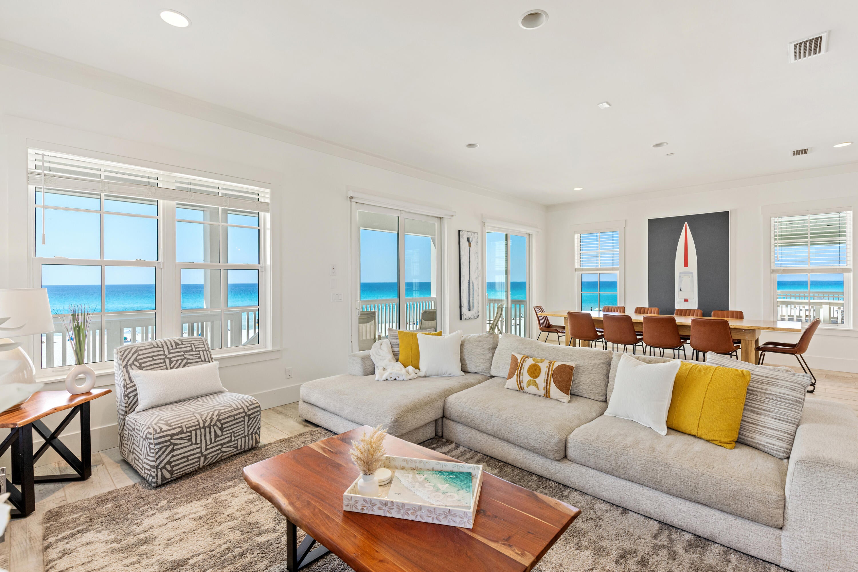Exceptional turn-key opportunity to own a 5-bedroom Gulf-front home on the highly desirable west end of Panama City Beach. Nestled in the serene setting of Laguna Beach, this home offers peaceful coastal living while keeping you close to the action. Rosemary Beach & 30Avenue are just ~7 miles west and Pier Park & Frank Brown Park are only 2.4 miles east. Set on nearly a quarter acre with 53 feet of Gulf frontage, the property features a private boardwalk to the beach, a heated pool deck & upscale finishes throughout. This is one of four homes owned by the same seller, offering additional options or the opportunity for a multi-home purchase to enhance rentability. The open floor plan, soaring ceilings, & expansive outdoor spaces create an airy, inviting environment perfect for entertaining! Expansive glass windows and sliding doors fill the home with natural light while seamlessly connecting indoor and outdoor living, framing sweeping panoramic views of the Gulf and creating a stunning backdrop for nearly every room. The gourmet kitchen is flooded with natural light and overlooks the Gulf, featuring stainless steel appliances, a gas range, subway tile backsplash, Quartz countertops, elegant pendant lighting over the breakfast bar, ample cabinetry, and a pantry for storage. The adjoining dining area is anchored by a beautiful hardwood table, set against stunning Gulf views, adding effortless elegance to every meal. Porcelain flooring flows throughout the home, complementing the Quartz countertops in the kitchen and bathrooms.

Each bedroom offers a private ensuite bathroom, a rare feature, with floor-to-ceiling tiled showers, glass surrounds, and Quartz vanities. The main level includes a king bedroom with ensuite and a convenient half bath. Upstairs, enjoy two Gulf-front primary suites each with a private balcony, a queen guest bedroom, and a bunk room with a full and twin double bunks. The larger Gulf-front primary suite includes a walk-in closet, a soaking tub with Gulf views, double Quartz vanity, and an exceptional walk-in shower with tile and glass surround.

Outdoor living is exceptional with a Gulf-front pool deck, large balconies, covered patio with loungers, dining table, and an outdoor grill--all perfect for al fresco dining and coastal relaxation. Built in 2022, this home exudes classic coastal character with a Hardie board exterior and metal roof.

Nearby, enjoy dining options like the new McGuire's Irish Pub, Thomas' Donuts & Snack Shop, and Back Beach Barbecue, plus endless choices at Pier Park--Panama City Beach's premier shopping, dining, and entertainment complex. Russell Fields Pier sits just 1,500 feet into the Gulf, perfect for walking, fishing, or securing daily licenses. Additional recreation options include Topgolf, a Ferris wheel, AMC Theatre, arcade, and over 200 acres at Frank Brown Park, only two miles away.

With dolphins playing in the Gulf, breathtaking sunsets, and unparalleled coastal amenities, this home is a cherished locals' favorite and a truly exceptional retreat.