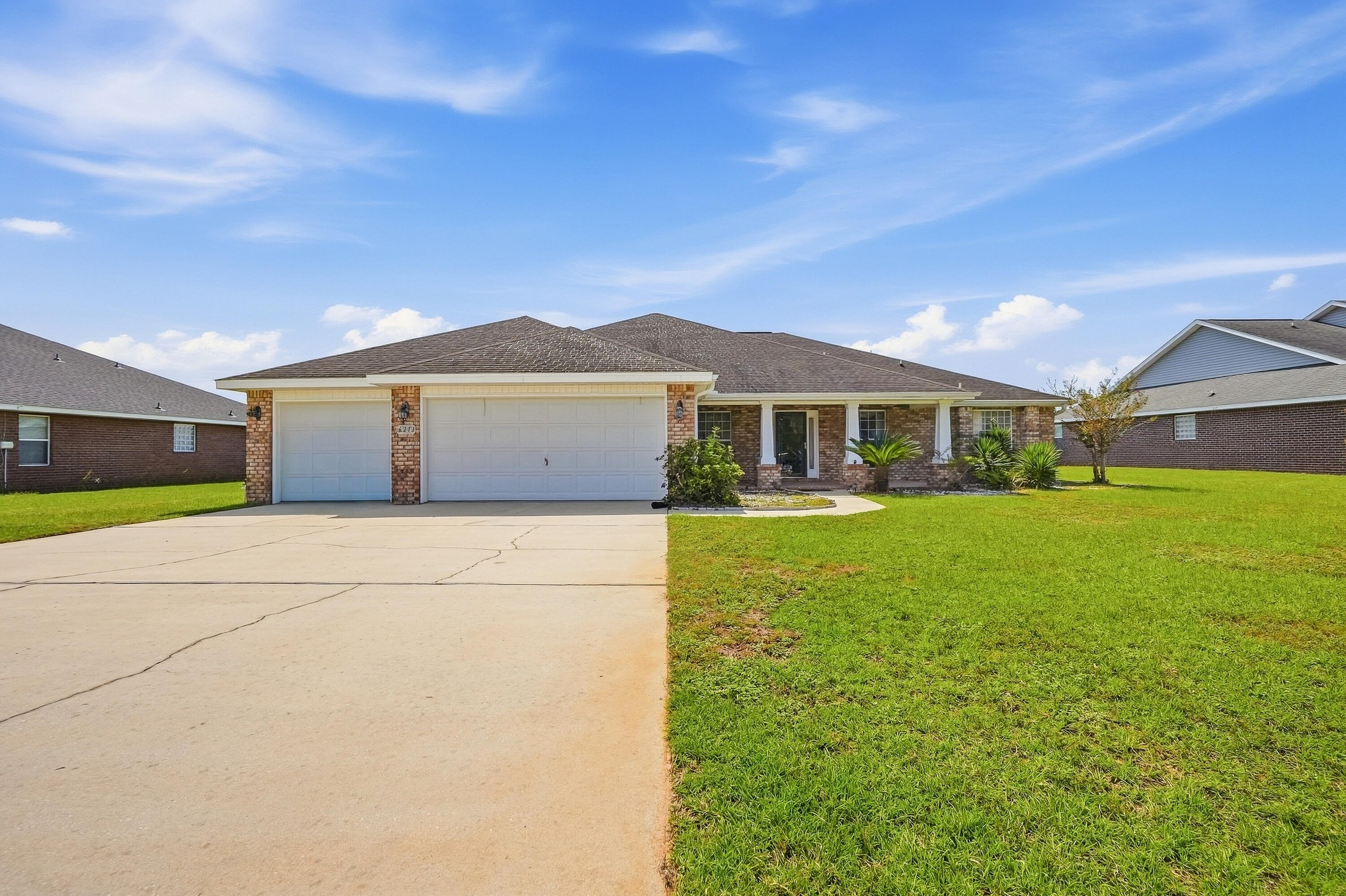 Welcome to a thoughtfully designed 4-bedroom, 3.5-bath home in North Crestview that balances everyday comfort with effortless entertaining. Featuring an expansive open-concept living area, this property also offers a 3-car garage, a dedicated front office/flex room, and a formal dining room. At the heart of the home, the kitchen showcases 3 cm granite countertops with beveled edges, stainless steel appliances, a center working island, and an oversized flat breakfast bar ideal for gathering. Throughout the high-traffic and wet areas, 20x20 porcelain tile is set on the diagonal with custom border accents. The primary suite provides a private retreat, while bedrooms two and three share a practical Jack-and-Jill bath. Step outside to the screened covered porch, complete with dual ceiling fans and direct access to an adjacent full bath for ultimate convenience. Enjoy peaceful views across the fully fenced half-acre yard, offering plenty of space and complete perimeter privacy.