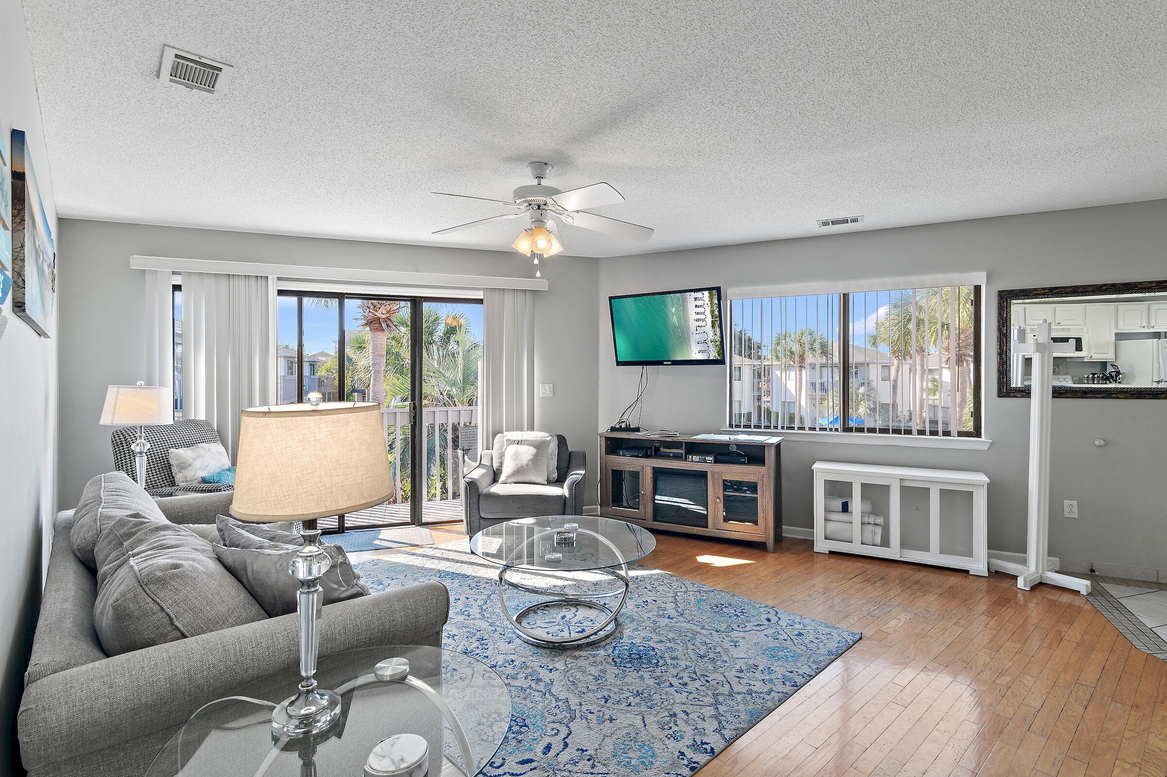 This top floor and fully furnished unit at Crystal Village located just 2.5 blocks from the spectacular South Walton beaches and Pompano Joe's beachfront restaurant!  Never miss a sunset in this end unit with a spacious private deck overlooking perfectly manicured grounds and a community pool, one of two at Crystal Village. This unit is the perfect vacation rental as the second bedroom includes bunks and an owner's closet as well. Crystal Village is perfectly located between Scenic Hwy 98 and the main Hwy 98, with easy access to all of the restaurants, shopping, and of course the world class beaches that this area is famous for! Come take a look. Roof was replaced in 2023 and the HVAC in 2024. All new stairways and balconies added in 2025 as well. Buyer to please verify all information.