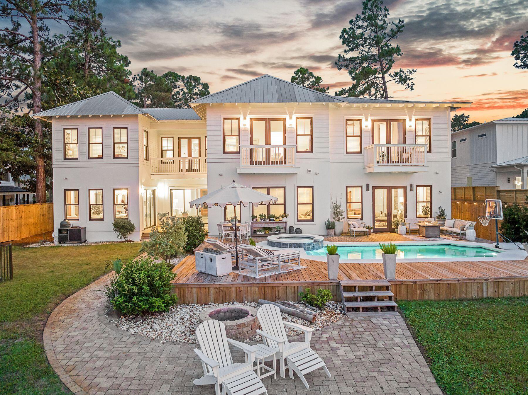 Priced below February appraisal of $4.6M and boasting a bonus depreciation estimate of over $740,000, this home is perfectly positioned along the serene shores of Choctawhatchee Bay, this exceptional Santa Rosa Beach estate offers a rare blend of luxury, privacy, and waterfront living. Set on more than half an acre with 100 feet of pristine bay frontage, the property presents sweeping water views, private bay access, and thoughtfully designed spaces ideal for both entertaining and everyday relaxation. Located just minutes from Scenic Highway 30A, residents enjoy quick access to world-renowned beaches, gourmet dining, boutique shopping, and lively cultural experiences.

The main residence spans approximately 6,300 square feet, boasting five bedrooms and 5.5 baths. A soaring double-height foyer welcomes you with unobstructed bay views, leading into an open-concept living area that seamless connects indoor and outdoor spaces. The chef's kitchen is outfitted with custom cabinetry, professional-grade appliances, and floor-to-ceiling windows that flood the space with natural light and capture breathtaking waterfront vistas.

Perfect for entertaining, the expansive living and dining areas open to a resort-style outdoor retreat featuring a heated pool, spa, and oversized sun deck. Whether hosting sunset soirées or enjoying peaceful mornings by the water, this outdoor oasis delivers the ultimate coastal lifestyle.

Upstairs, the grand primary suite is a tranquil escape, complete with floor-to-ceiling windows overlooking the bay, a luxurious spa-inspired ensuite with dual vanities, a walk-in shower, and a private water closet. Additional guest suites, a theater room with a wet bar, and an upstairs bonus space ensure comfort, entertainment, and privacy for all.

The detached carriage house provides 1,500 square feet of additional living space, featuring two bedrooms, 1.5 bathrooms, a full kitchen, and an open living and dining area. Ideal for guests or extended family, this beautifully appointed space features a private, wraparound porch with water views and its own entrance, accessible via an interior staircase.

For boating enthusiasts, the property features a private dock with a boat lift, a Jon boat/kayak launch, and a seawall, offering effortless access to open-water adventures. boasting a large boat house that is 38' wide and 32' long, capable of accommodating your favorite boat

Offering the perfect blend of elegance, function, and lifestyle, this bayfront estate is a true coastal sanctuary, moments from 30A, yet worlds away.