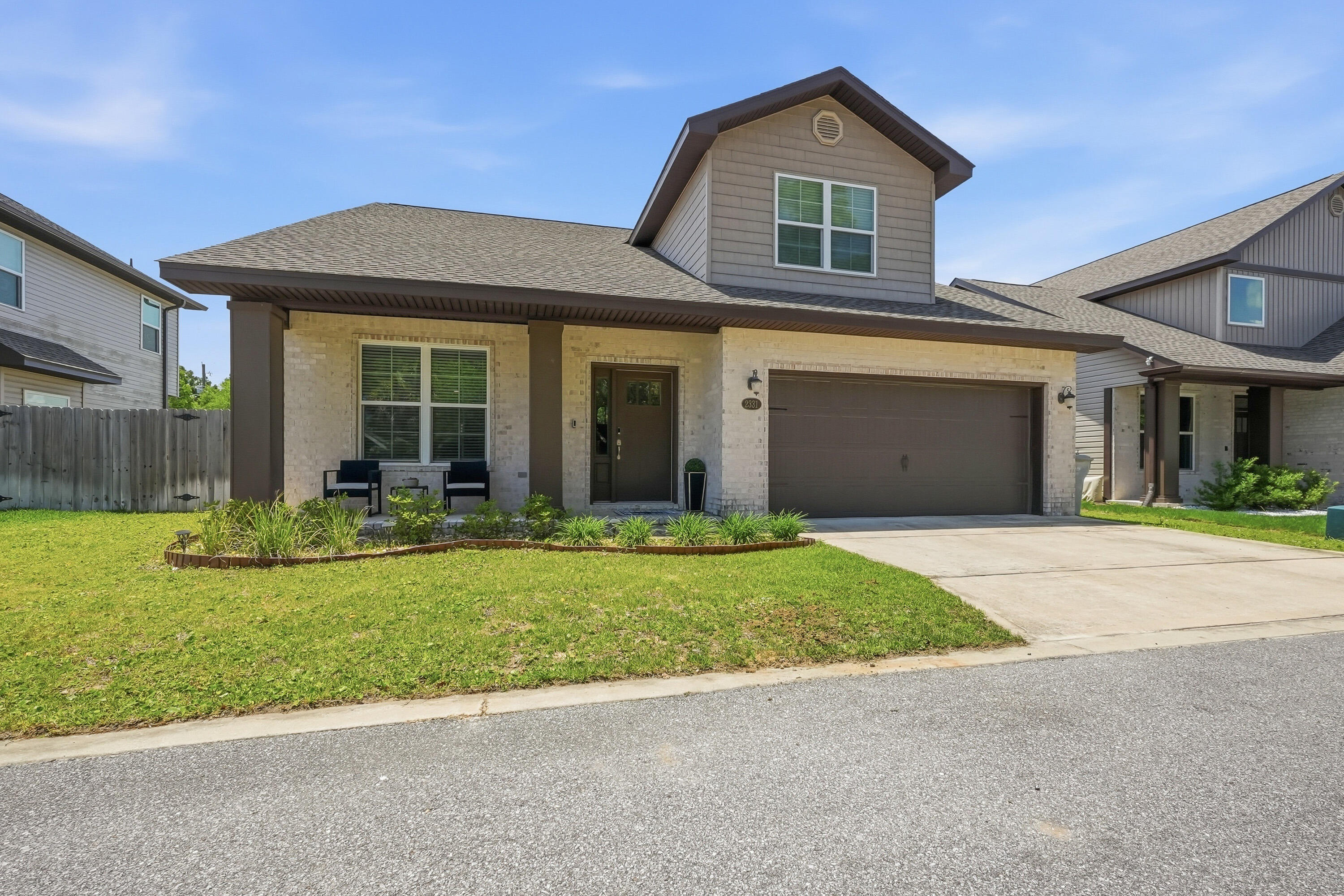 **Two living areas, four bedrooms, and newer construction near Hurlburt Field!** Built in 2022 by Robbins Builders, this move-in-ready Navarre home offers 4 bedrooms, 2.5 baths, and room to spread out. **Plus, qualified buyers may receive a $2,500 lender credit at closing when using the preferred lender.** Ask for details.

The bright, open kitchen features white shaker cabinetry with crown molding, granite countertops, stainless steel appliances, and a large island with seating and prep space. The primary suite includes dual granite vanities and an oversized tiled shower. Three additional bedrooms offer flexible space for guests, an office, or hobbies.

Enjoy the covered patio and privacy-fenced backyard with no direct rear neighbors. An EV charger and custom hurricane fabric shields add practical touches. With access to Hurlburt Field, Navarre Beach, Highway 98, shopping, dining, and parks, 2331 Hadleigh Hills Court is ready for you to see in person. Schedule your showing today!