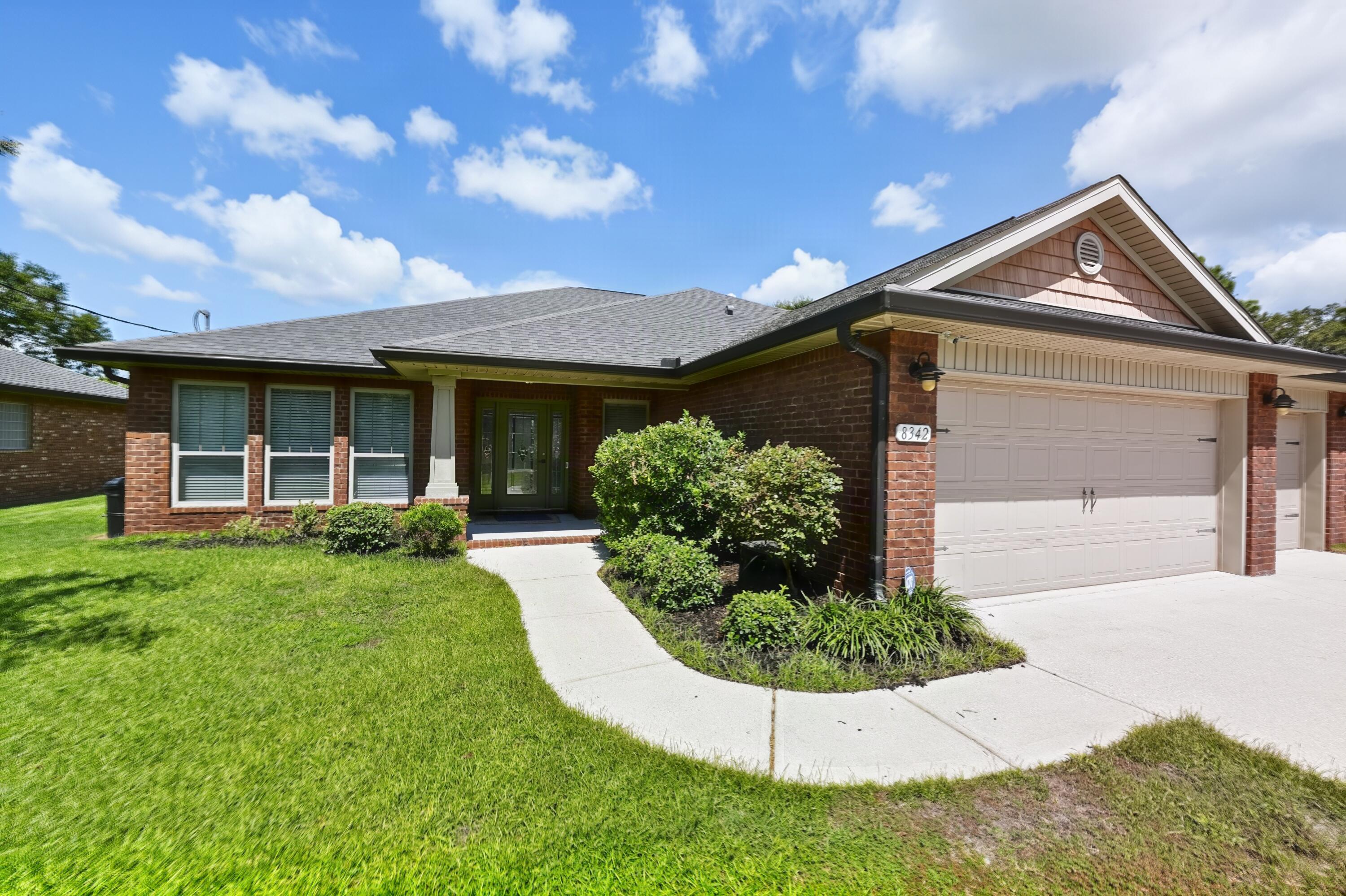 Welcome to 8342 Randall Drive in Navarre, a beautifully maintained Whitworth Builders home filled with custom touches and thoughtful upgrades. From the moment you step inside, the 10-foot ceilings in the main living areas and elegant tray ceilings create an open, spacious feel. Recessed lighting and ceiling fans add comfort and style throughout, while fresh interior paint and all-new luxury vinyl plank flooring give the home a clean, updated, almost-new feel.

The kitchen is designed for everyday living and entertaining, featuring a French-door refrigerator, generous workspace, and a layout that flows easily into the main living areas. The home's custom details, quality construction, and well-planned spaces set it apart from the typical cookie-cutter property.

Outside, enjoy a welcoming backyard with room to relax, entertain, or simply enjoy the Northwest Florida sunshine. The property sits on high ground and is not located in a flood zone, an increasingly important consideration for Florida buyers.

The location brings it all together. Enjoy an easy commute with convenient access to schools, shopping, restaurants, and everything Navarre has to offer. Best of all, the world-famous white-sand beaches of Northwest Florida are mere minutes away.

People travel from across the country to vacation here. You can live here every day.
