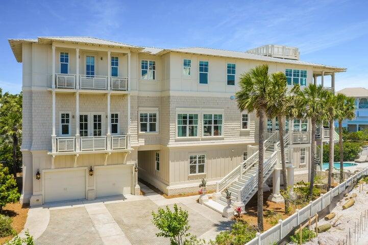 Located behind the private gates of Seclusion Dunes, this 6,000+ sq ft beachfront home offers sweeping views of the Gulf of Mexico and Deer Lake State Park. Designed for large groups, the home features multiple living areas, a rooftop viewing deck, bunk rooms, and an oversized balcony with unobstructed coastline views. A private boardwalk leads directly to the beach, and the backyard includes a lagoon-style pool with room for future enhancements--making this an ideal second home or high-performing rental opportunity!