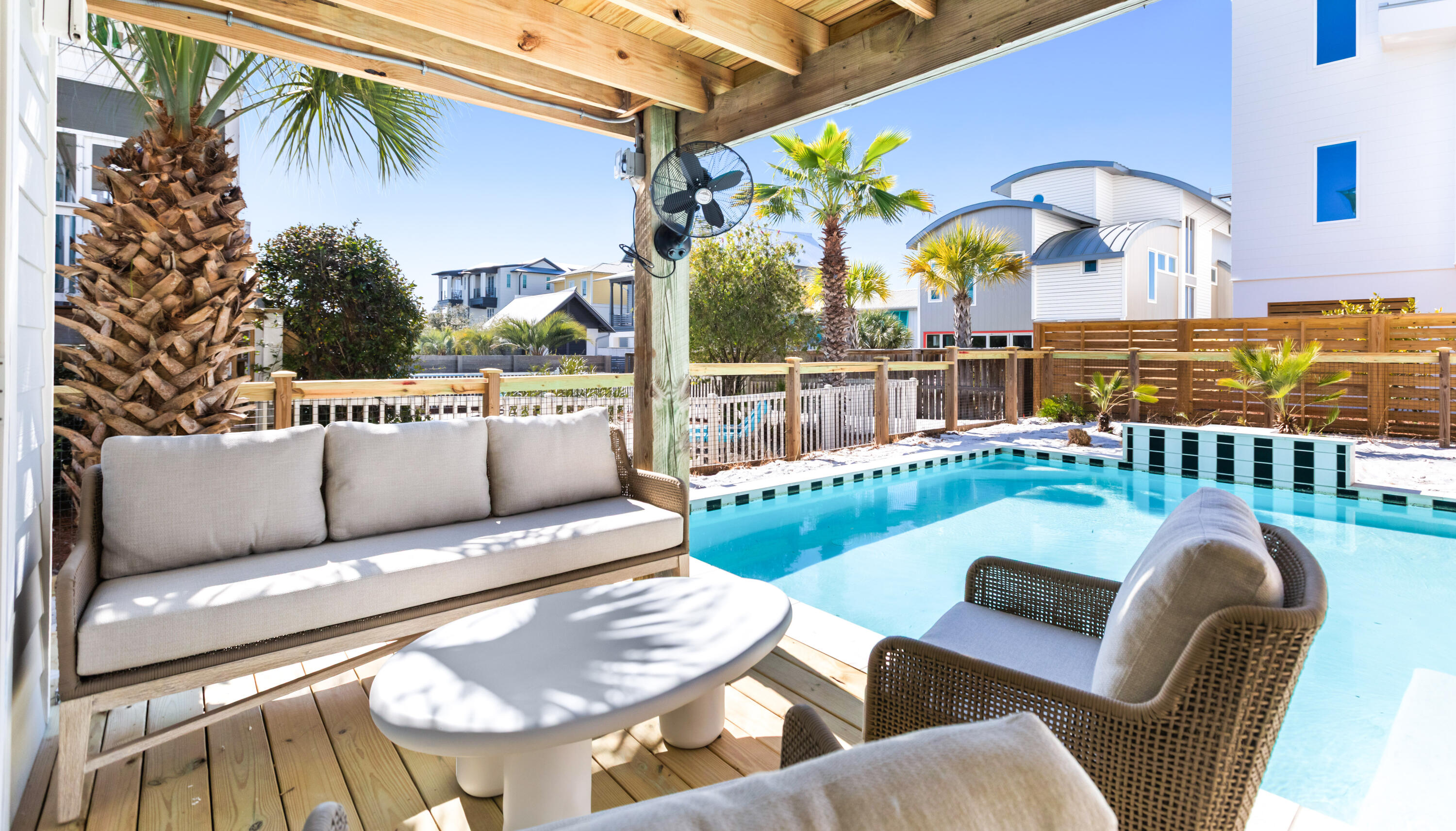 Welcome to 186 Magnolia Street - Where Old Grayton Soul Meets Refined Coastal Design - a completely reimagined coastal retreat that captures the quintessential Old Grayton Beach vibe-retro, relaxed, and effortlessly cool-this property is designed to entertain, built to endure and be coveted by guests and is just a short walk to two beach accesses. This stunning 4-bedroom, 4.5-bath home has been fully remodeled from top to bottom, blending vintage surf-style charm with modern luxury and high-end finishes throughout. The property offers exceptional parking with a garage featuring an epoxy floor, an additional carport, and a large driveway accommodating up to seven vehicles. The first level welcomes you with wood-planked tile flooring, a comfortable sitting area, and an inviting living space complete with a wet bar, ice maker, wine refrigerator, and a striking custom tile accent wall. A first-floor primary suite features an ensuite bath with a soaking tub and custom tile work. A stylish half bath with shiplap accents completes the interior. Step outside to the expansive first-floor deck, showcasing a large, heated pool with a chair deck, an herb garden with pergola, and space designed for outdoor living. (A paver walkway and pool deck are currently being completed.) The second and third levels feature beautiful oak wood flooring throughout. The second level offers a light-filled sitting area, dining space, and living room with a gas fireplace. The galley-style kitchen is outfitted with Thermador appliances, quartz countertops, open shelving, and a breakfast bar-perfect for entertaining. A hallway leads to a guest bedroom with an ensuite bath and private balcony overlooking the front yard, a bunk room with two full-size bunks and a full bath, and a conveniently located laundry room. The third level is dedicated to a serene primary suite, complete with an ensuite bath featuring dual vanities and a custom-tiled shower. A private balcony offers beautiful Gulf views, creating the perfect escape. Major upgrades include all new impact-rated windows and doors, new wiring and plumbing, new tankless water heater, three new HVAC units, and a new 30-year architectural shingle roof-offering peace of mind and modern efficiency. 186 Magnolia Street is a rare opportunity to own a thoughtfully updated beach home that honors the timeless Grayton Beach aesthetic while delivering today's comforts-all in one of the area's most beloved locations. Grayton Beach is beloved for its eclectic, retro surf culture, tree-lined streets, and an atmosphere that feels authentically coastal. Home to Grayton Beach State Park, world-class dining, and a strong sense of community, this is one of 30A's most sought-after and enduring neighborhoods. Whether envisioned as a refined personal escape, a legacy beach home, or a property with strong rental appeal thanks to its layout, amenities, and premier location, 186 Magnolia Street represents a rare opportunity to own a true Grayton Beach classic-elevated, effortless, and undeniably timeless. This is more than a beach house; this is a Grayton Beach Statement! Now is your chance to live the Grayton Beach Life-Artful, Authentic, and Unmatched!