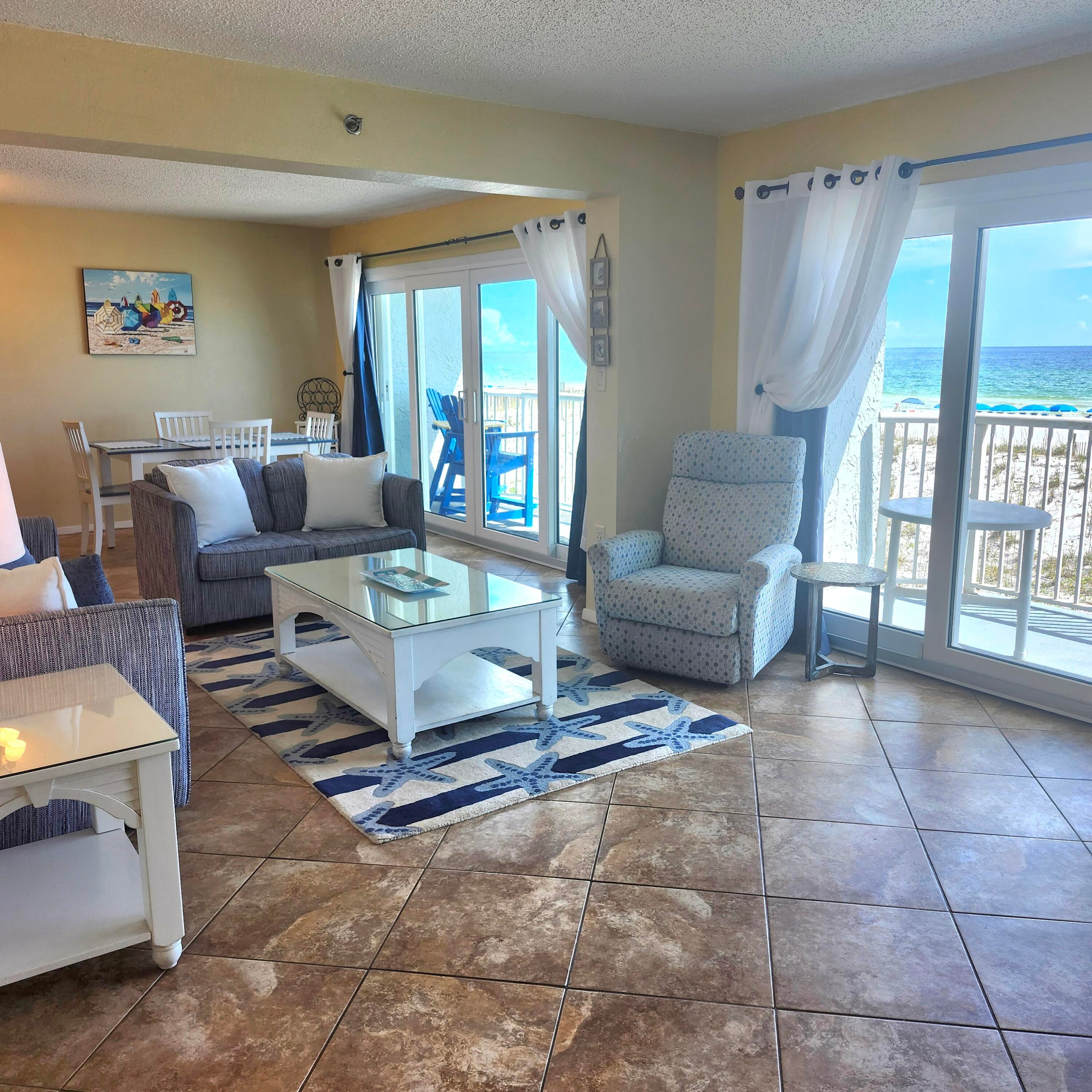 Expansive views of the emerald, green water and crystal white sand beach from this 30-foot-wide gulf front unit. Huge living area with two sliding glass doors for double the view and space for everyone. Split bedroom plan for privacy.  Master bedroom has king bed and second bedroom has 2 full beds plus a sleeper sofa in living area.  Two updated baths with granite counters, one with walk-in- tiled shower and one has a tub with a tile surround .  Fully equipped kitchen features granite counters, breakfast bar and great view.  Enjoy the direct view from the dining area just steps from the 30-foot-long balcony.  Laundry room offers full size washer and dryer.  Unit has 2 HVAC units for comfort control.  Best of all the heating and cooling costs are included in the condo fee.  Covered parking is available and pets are allowed for owners.  Islander offers a large, heated gulf side pool, picnic area with tables and grills, shaded shuffleboard court, fitness room and community room.  Located minutes from the shops and restaurants of downtown FT Walton Beach and a short drive to Destin.  Come and experience the ultimate in the beach lifestyle.  This unit is ready and waiting for you.